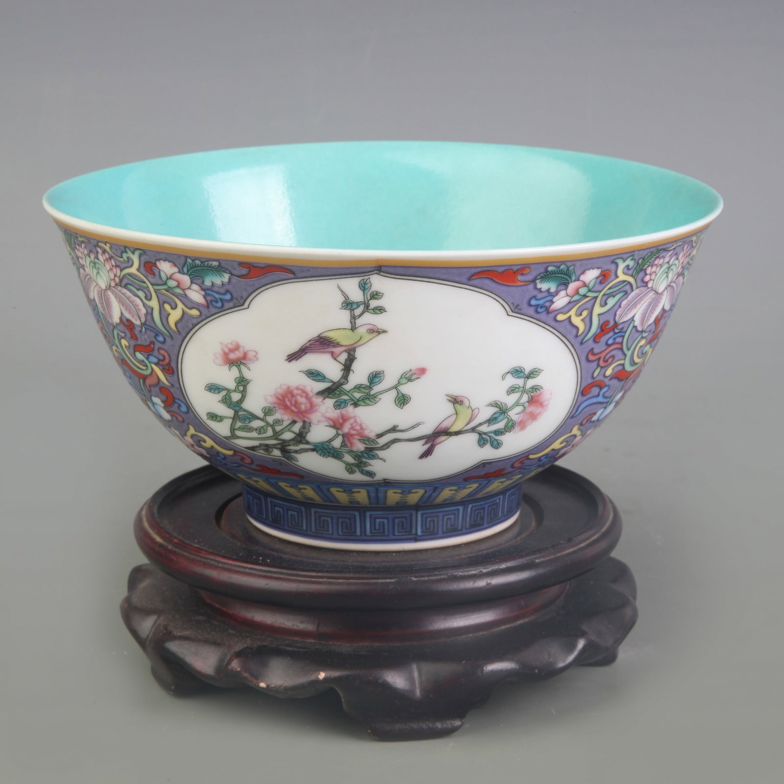 A FAMILLE ROSE BOWL WITH MEDALLIONS OF BIRD-AND-FLOWER ON BLUE GROUND: Qing Dynasty Yong Zhen Period; Diameter: 6.5 inch; High: 3.2 inch; Wooden base for picture and display only.