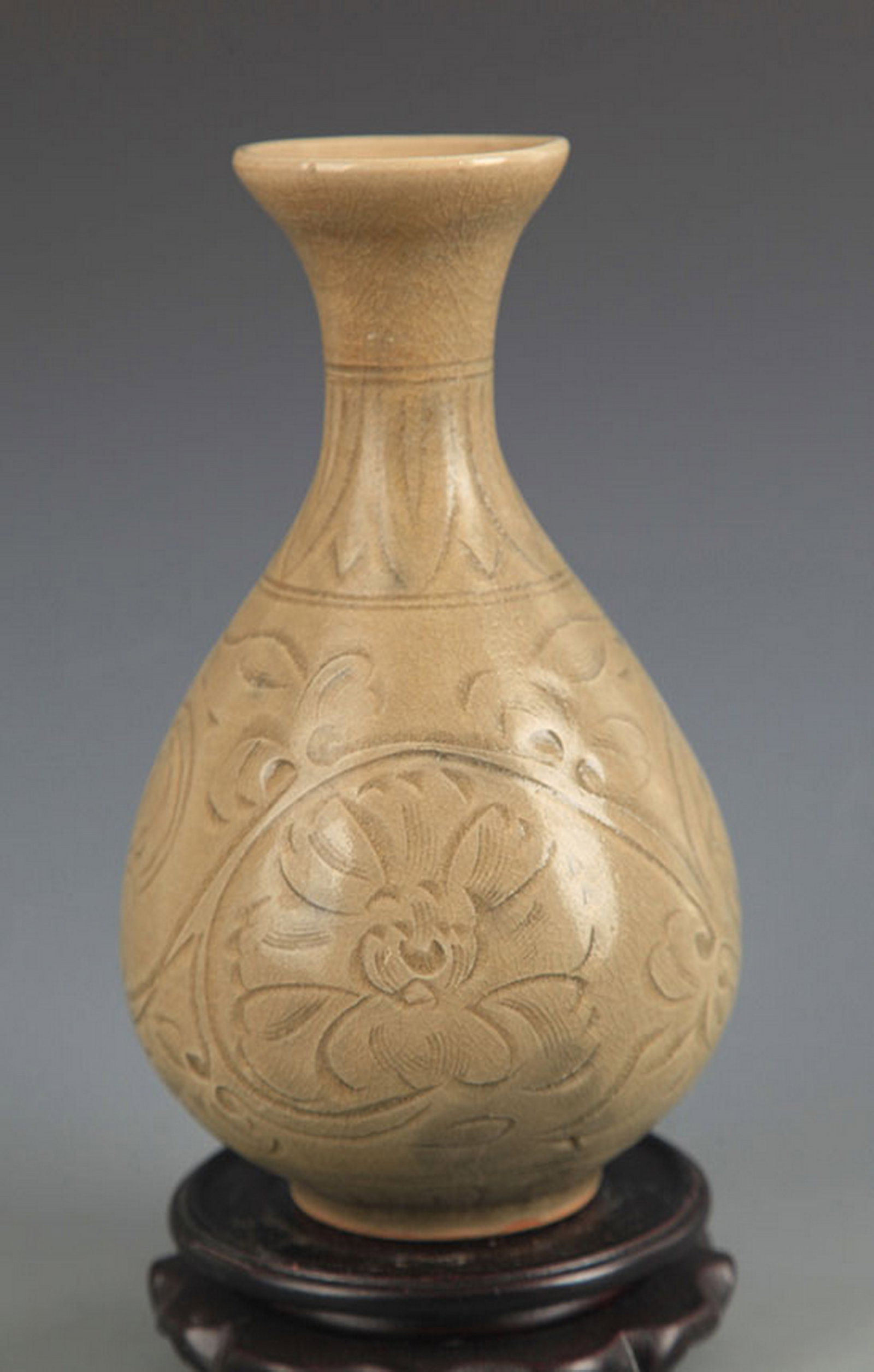 A YAOZHOU KILN-STYLE YUHUCHUN VASE WITH FLORAL DECORATION: Song Dynasty Style; High: 8.5 inch; Diameter: 2.5 inch; Wooden base for picture and display only.