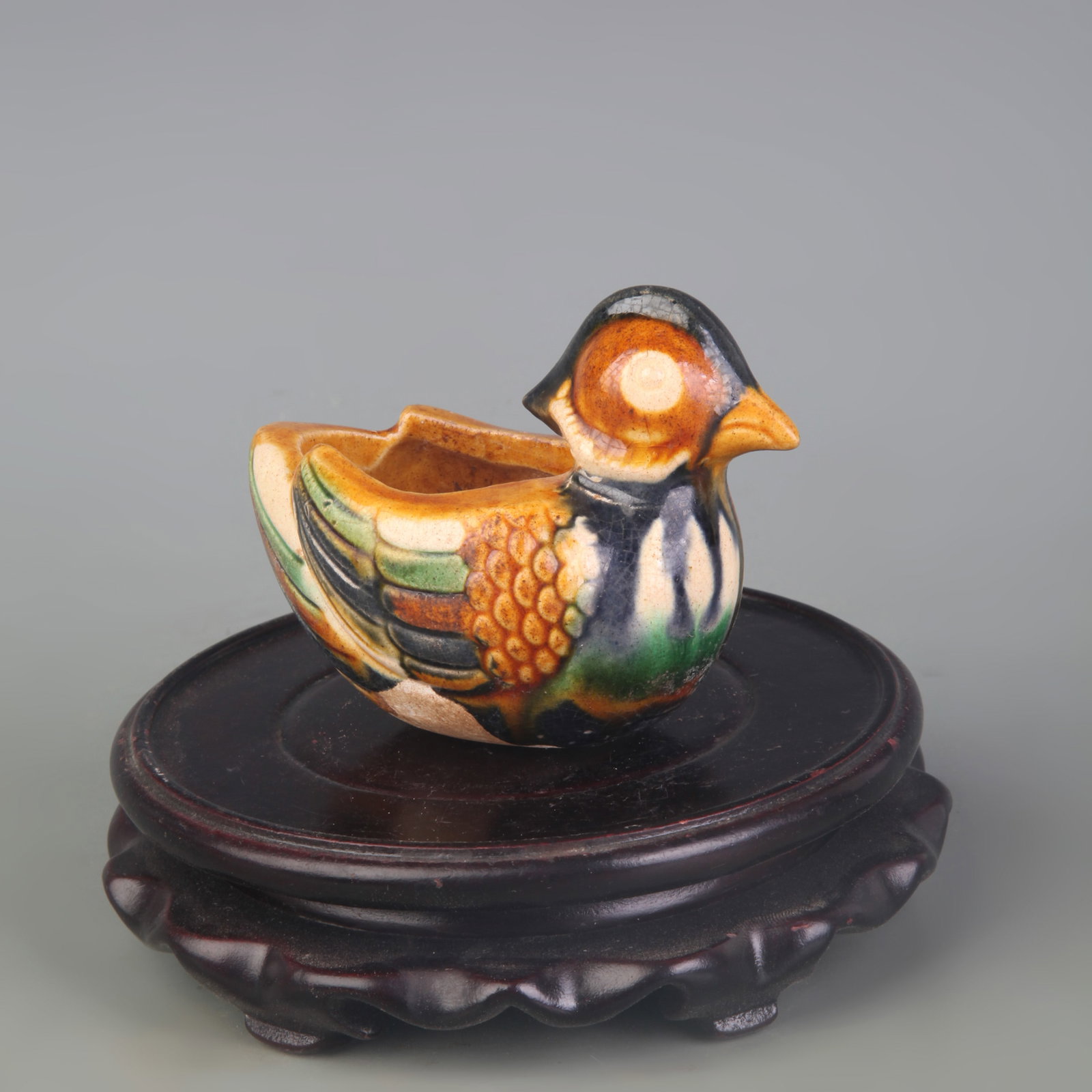 SANCAI GLAZE MANDARIN DUCK-SHAPED BRUSH WASHER: Song Dynasty Style; High: 2.7 inch; Wooden base for picture and display only.