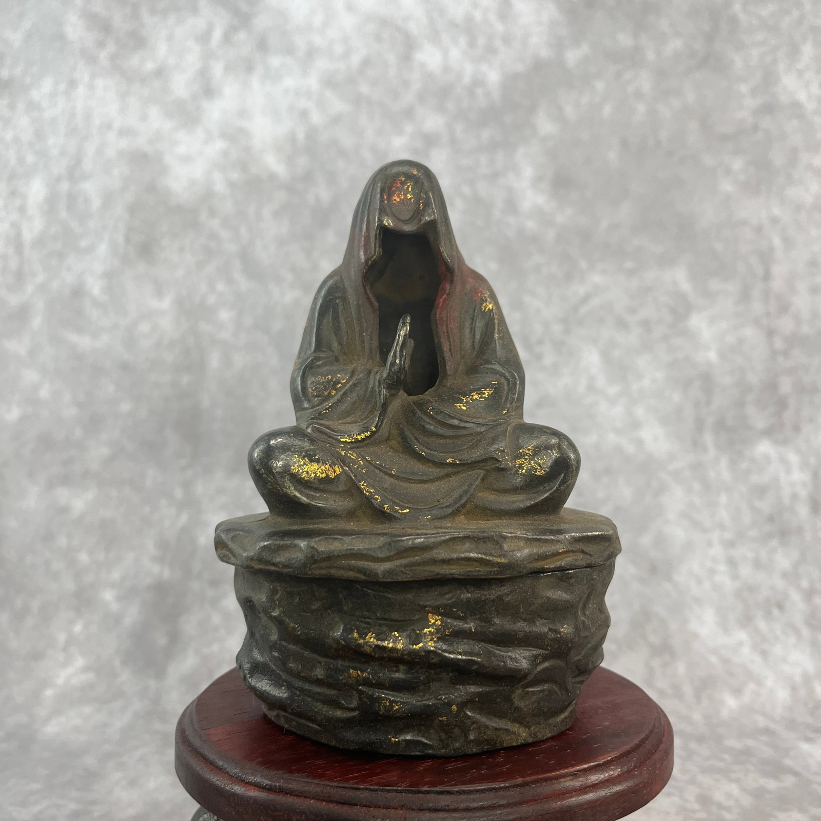 BRONZE "HOLLOW FACE" BODHIDHARMA BACKFLOW INCENSE BURNER: 19th Century; Long: 4.3 inch; Width: 3.5 inch; High: 5.7 inch. Wooden base for picture and display only.