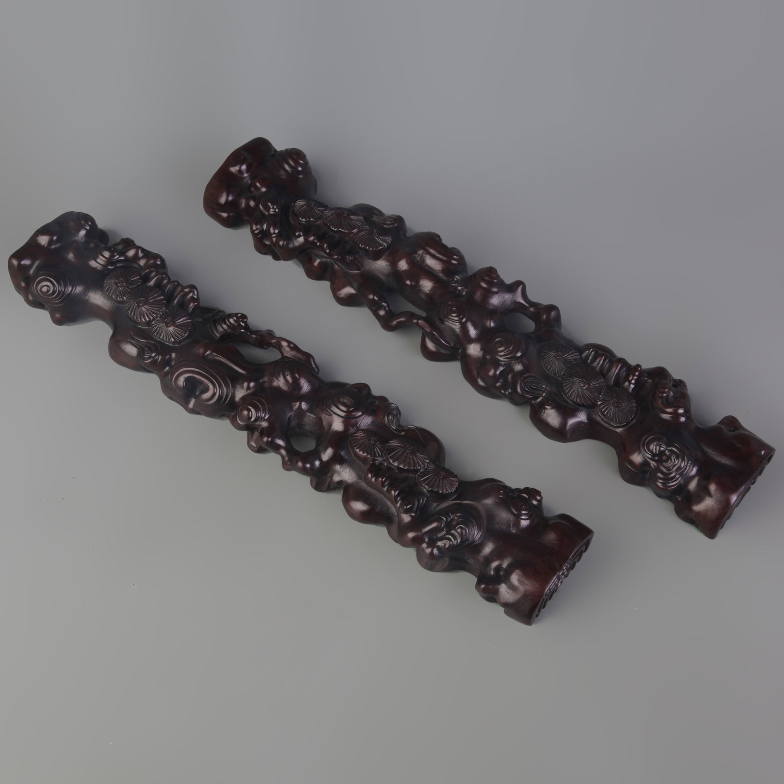 PAIR OF ZITAN WOOD PAPERWEIGHTS: Qing Dynasty; Long: 13.0 inch; Width: 2.4 inch; High: 1.0 inch. Wooden base for picture and display only.