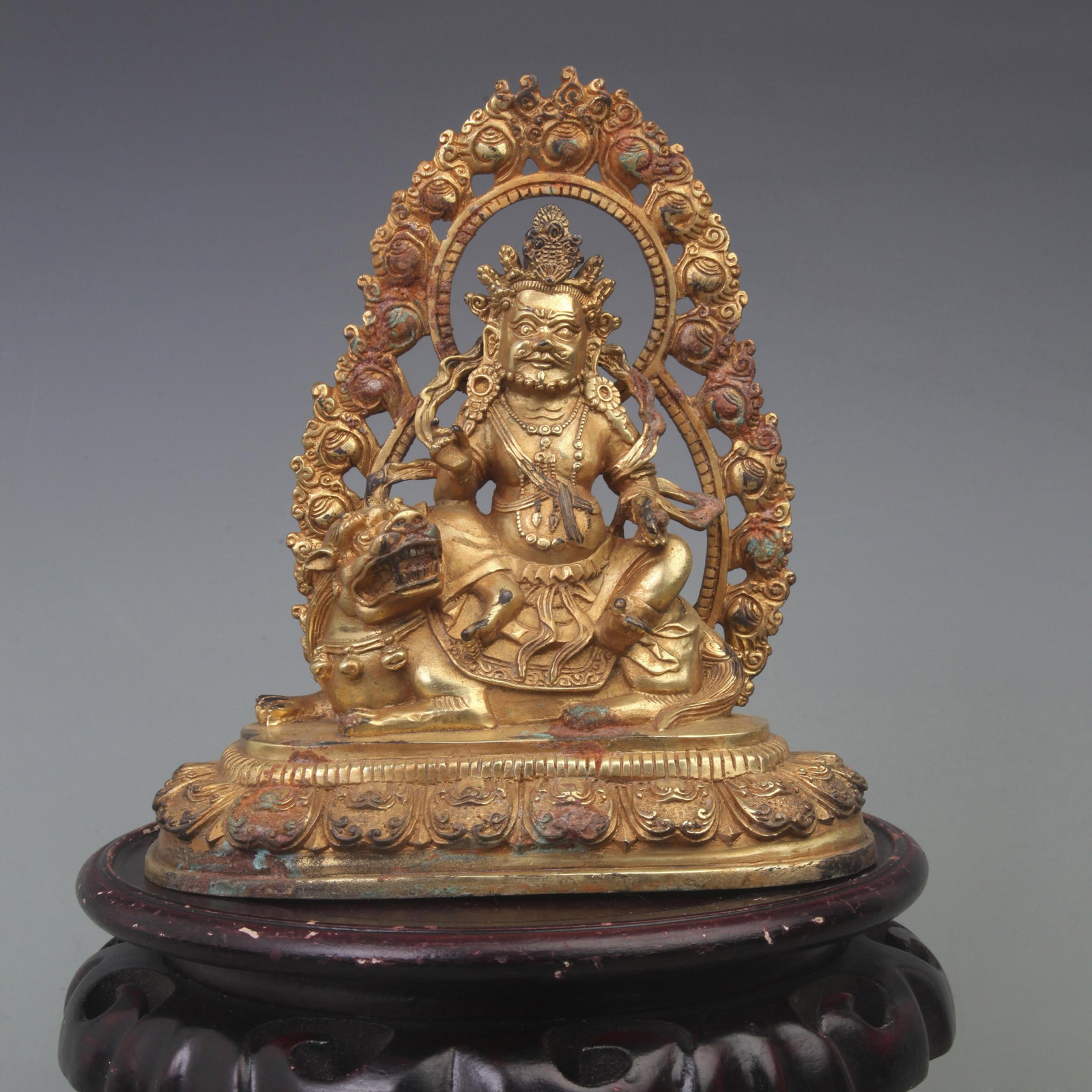A FINE BRONZE HAI BAO TIAN WANG STATUE: Ming Dynasty Style, Diameter: 7.4 inch High: 8.2 inch; Wooden base for picture and display only.
