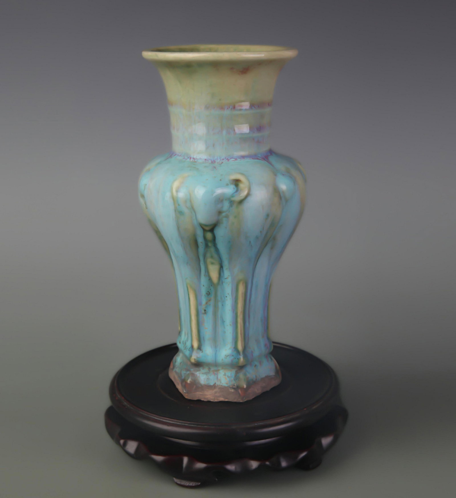 A JUN-GLAZED ‘THREE RAMS’ ZUN VASE (1 of 5)