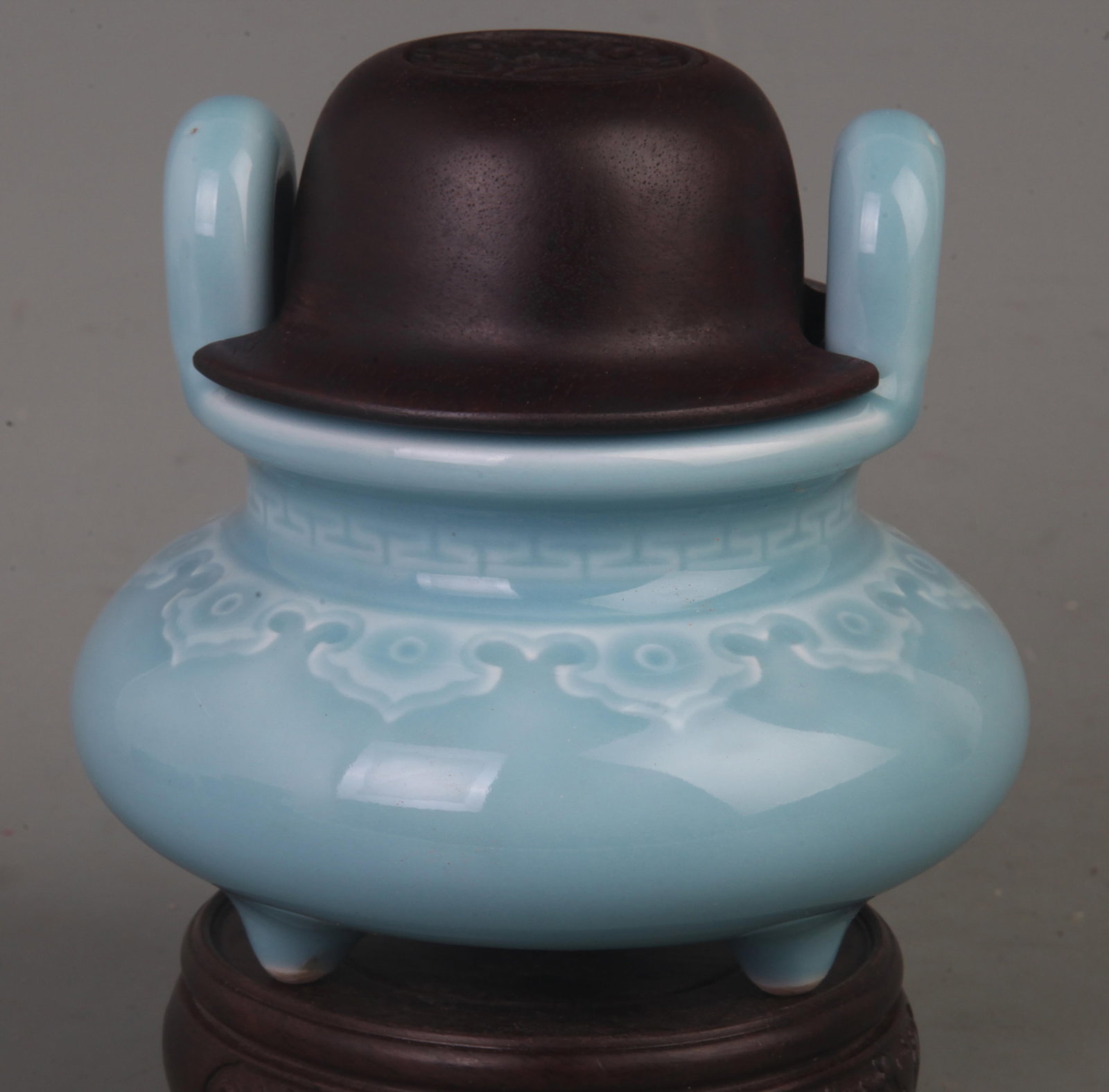 SKY BLUE GLAZED TRIPOD CENSER WITH UPRIGHT HANDLES AND HARDWOOD COVER: Song Dynasty Style; Diameter: 4.4 inch; High: 4.6 inch; Wooden base for picture and display only.