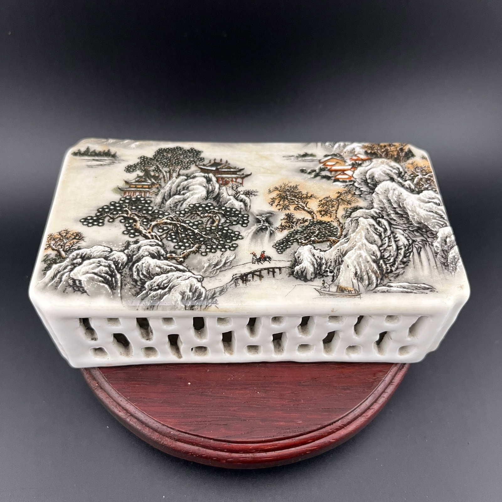 FAMILLE ROSE LANDSCAP PAINTING PORCELAIN INK REST: Republic Period; Long: 5.2 inch; Width: 2.8 inch; High: 1.4 inch. Wooden base for picture and display only.