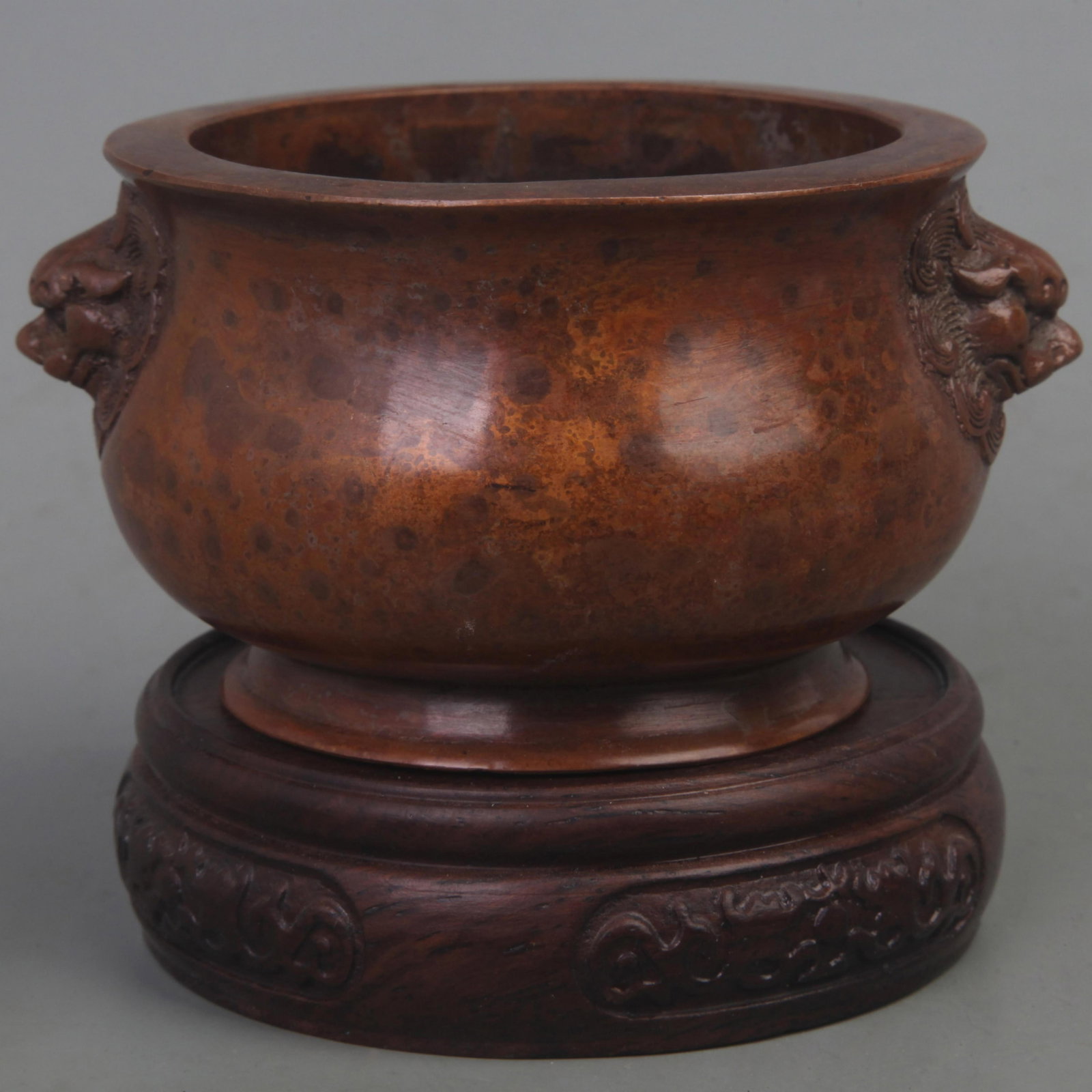 XUAN DE STYLE LION EAR ROUND BRONZE CENSER: Ming Dynasty Style; Diameter: 4.3 inch; High: 2.3 inch. Wooden base for picture and display only.