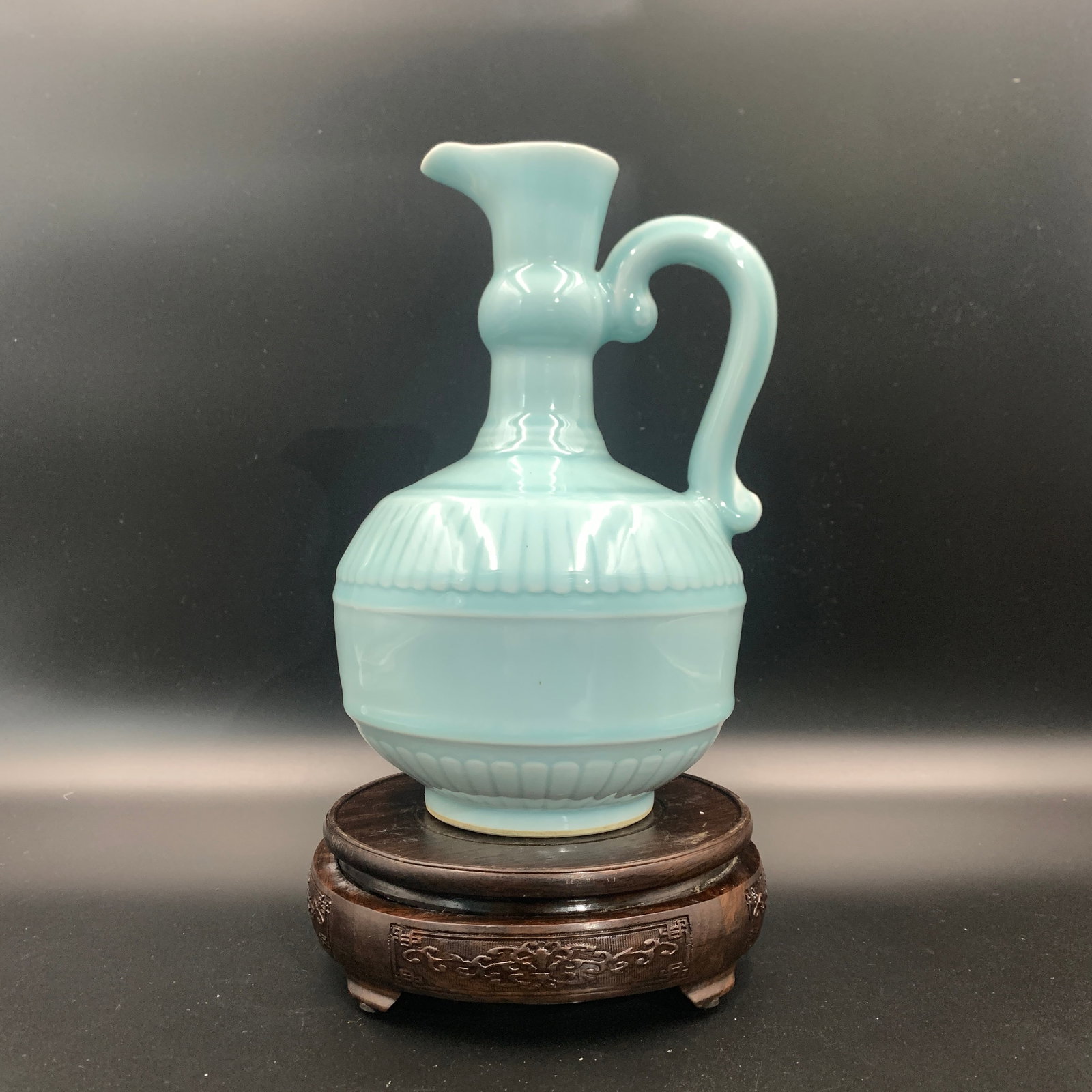 A FINE CELADON-GLAZED PORCELAIN EWER (1 of 5)