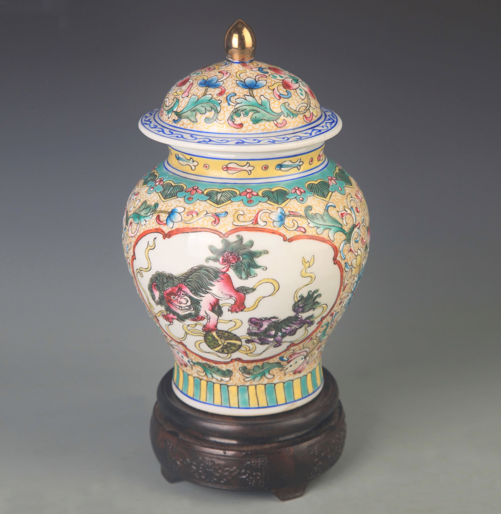 RARE FAIENCE COLOR LION PLAYING PATTERN GENERAL VASE: Qing Dynasty Qian Long Period; High: 9.0 inch Diameter: 3.5 inch; Wooden base for picture and display only.