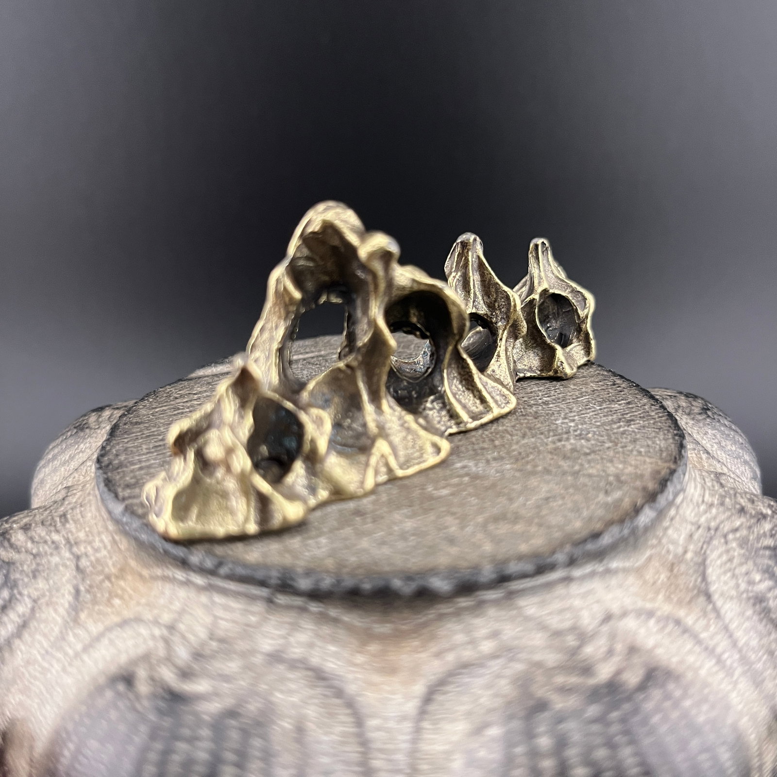 A SMALL BRONZE MOUNTAIN FIGURE - 2