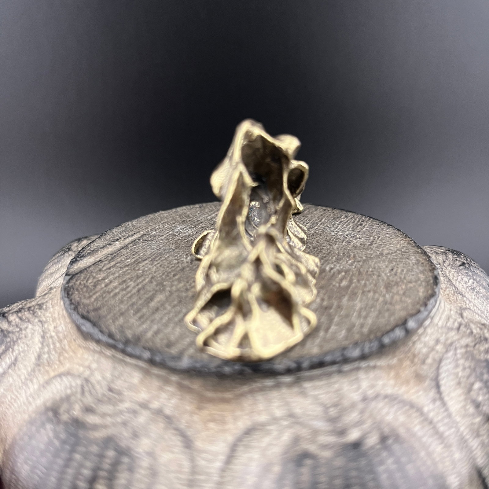 A SMALL BRONZE MOUNTAIN FIGURE - 4