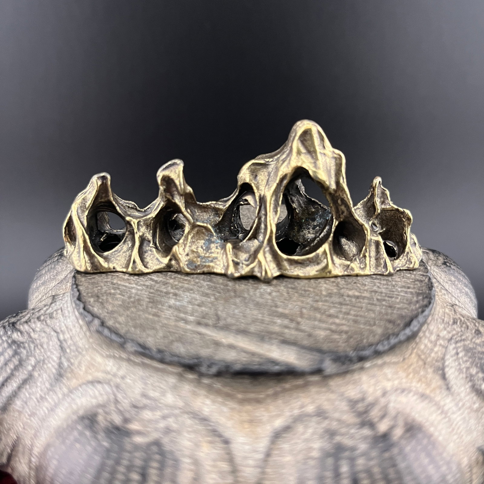 A SMALL BRONZE MOUNTAIN FIGURE - 5