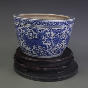 A BLUE-AND-WHITE Ã¢â‚¬ËœAUSPICIOUS BEASTS AND FLORALÃ¢â‚¬â„¢ ROLLED-RIM PORCELAIN