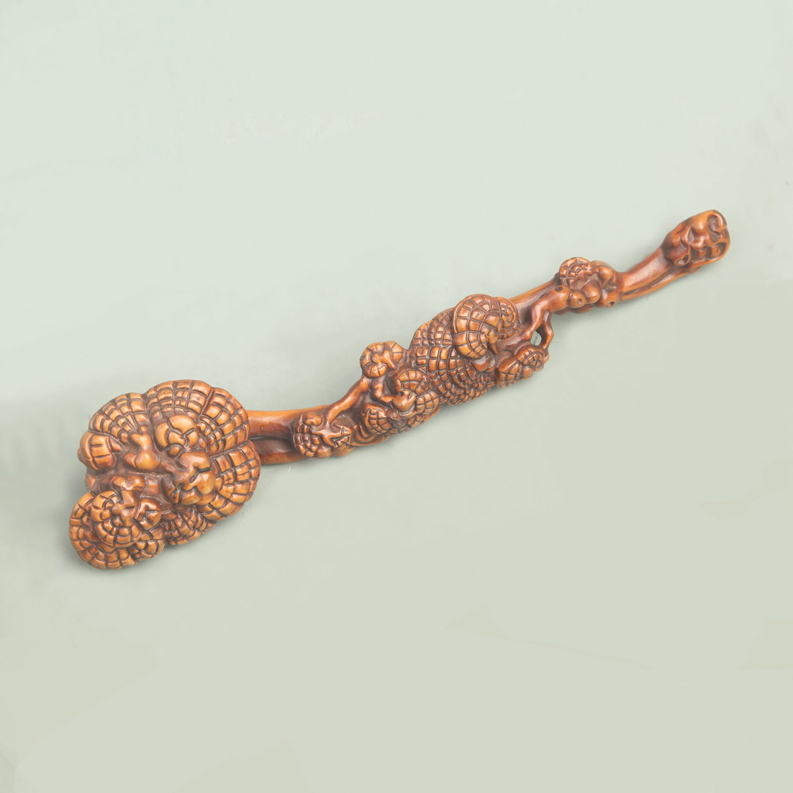 A BOXWOOD CARVING OF LINGZHI STYLE RUYI (1 of 4)