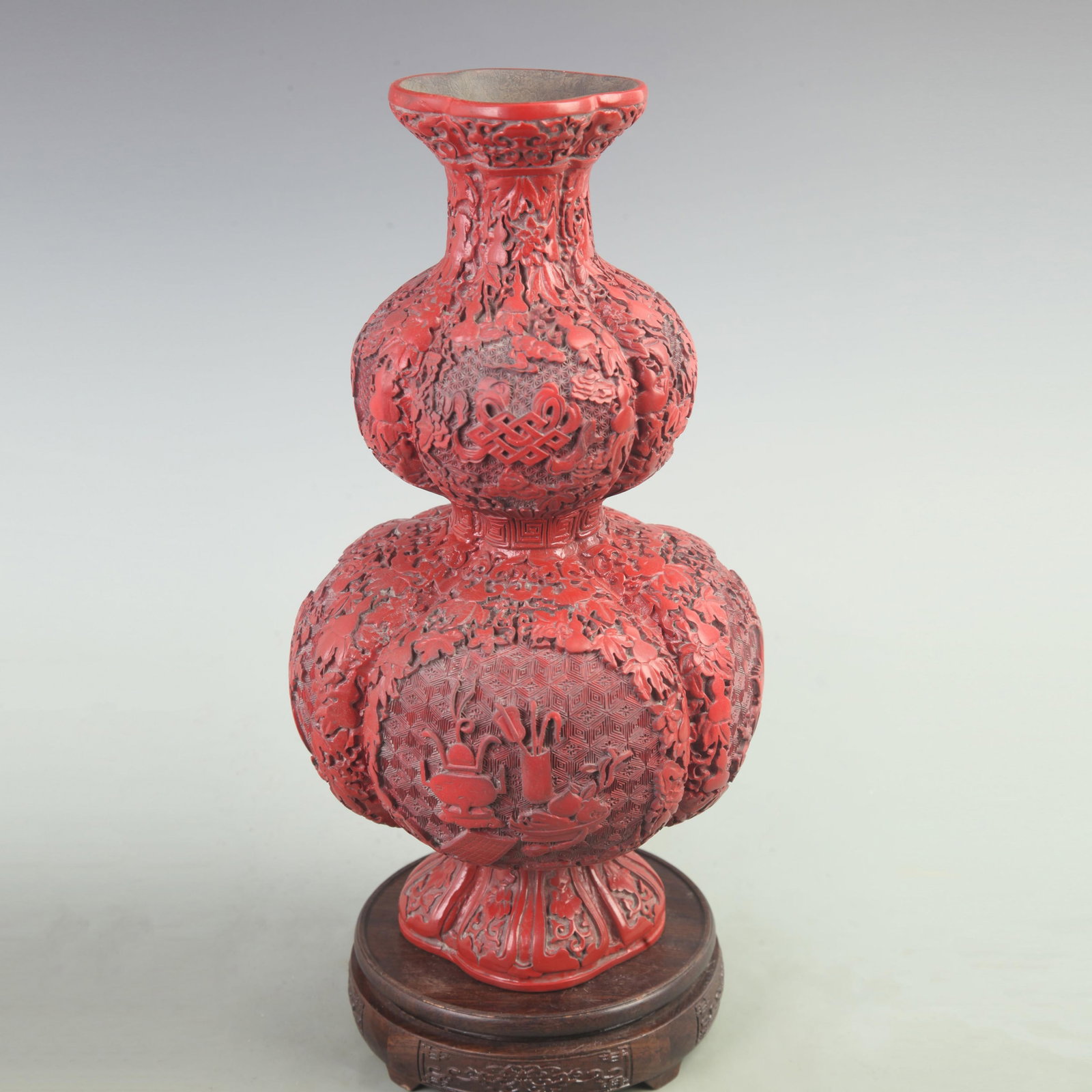 RARE RED CARVED LACQUER FLOWER CARVING CALABASH SHAPED BOTTLE: Qing Dynasty, High: 15 inch; Width: 7.5 inch; Long: 7.5 inch. Wooden base for picture and display only.
