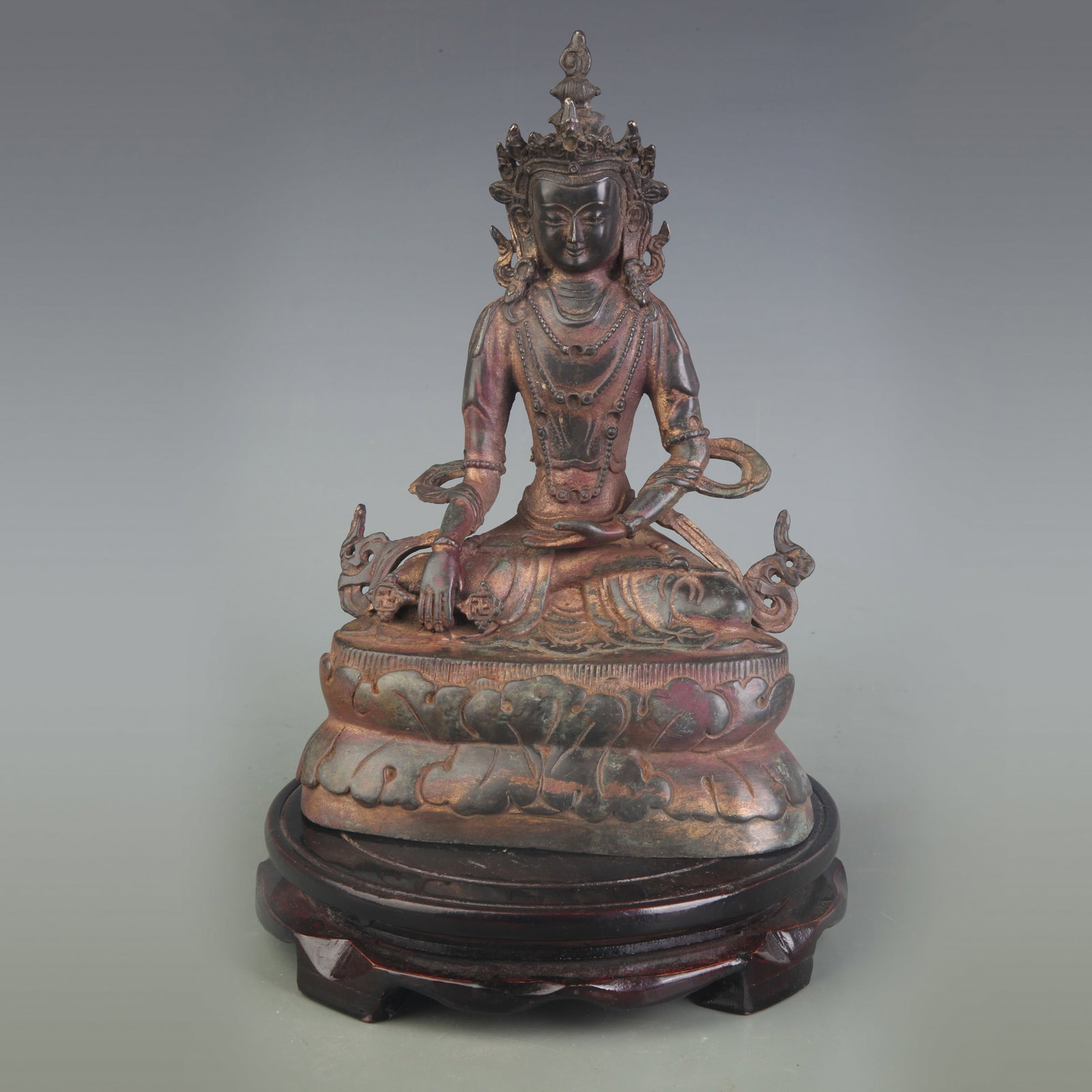 TIBETAN BRONZE STATUE OF GREEN TARA (SHYAMATARA): Qing Dynasty; Width: 8.0inch, High: 9.0inch; Woodbase for picture and display only