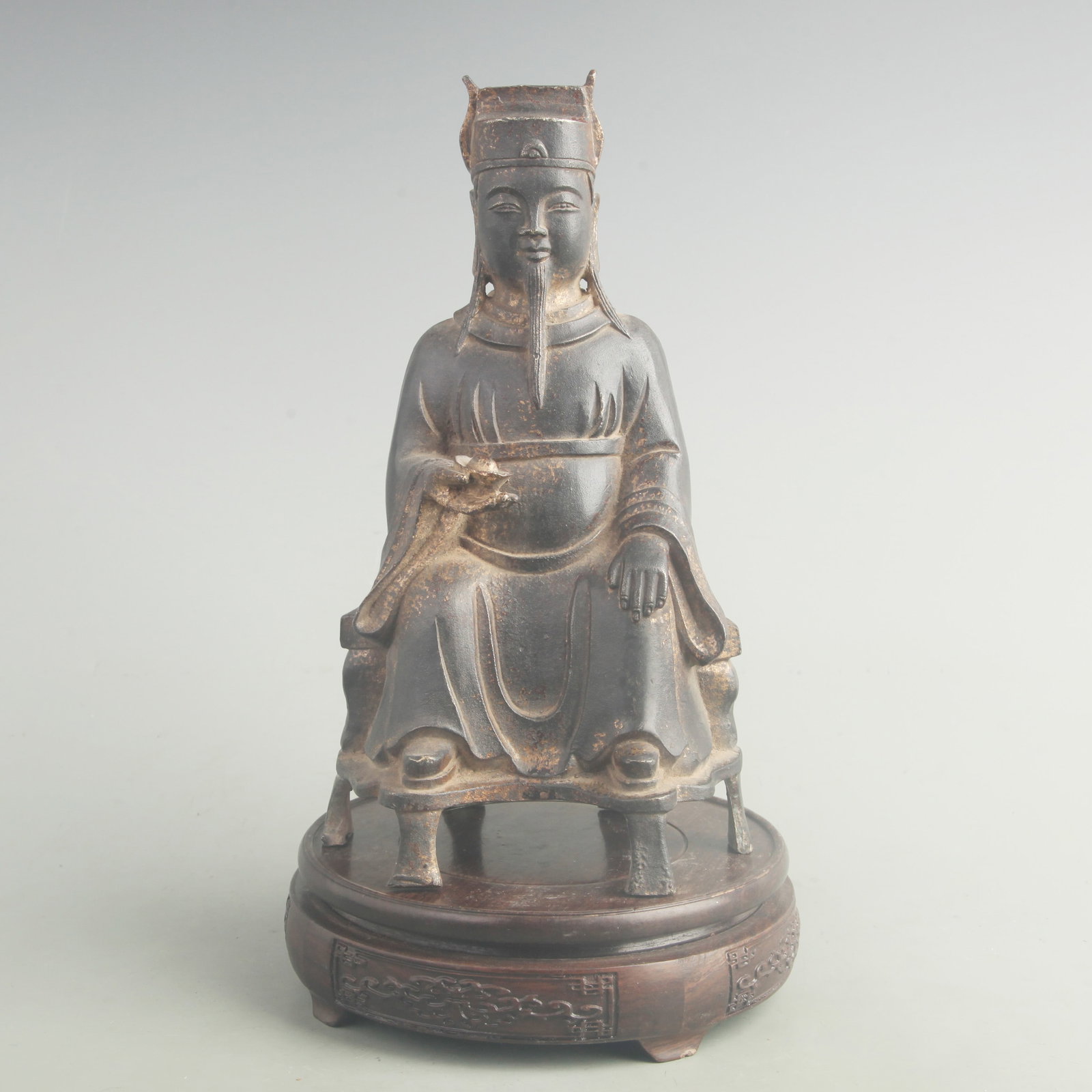 GILT-BRONZE FIGURE OF THE CIVIL WEALTH DEITY: Ming Dynasty; High: 9.20 inch; Width: 5.30 inch; Woodbase for picture and display only