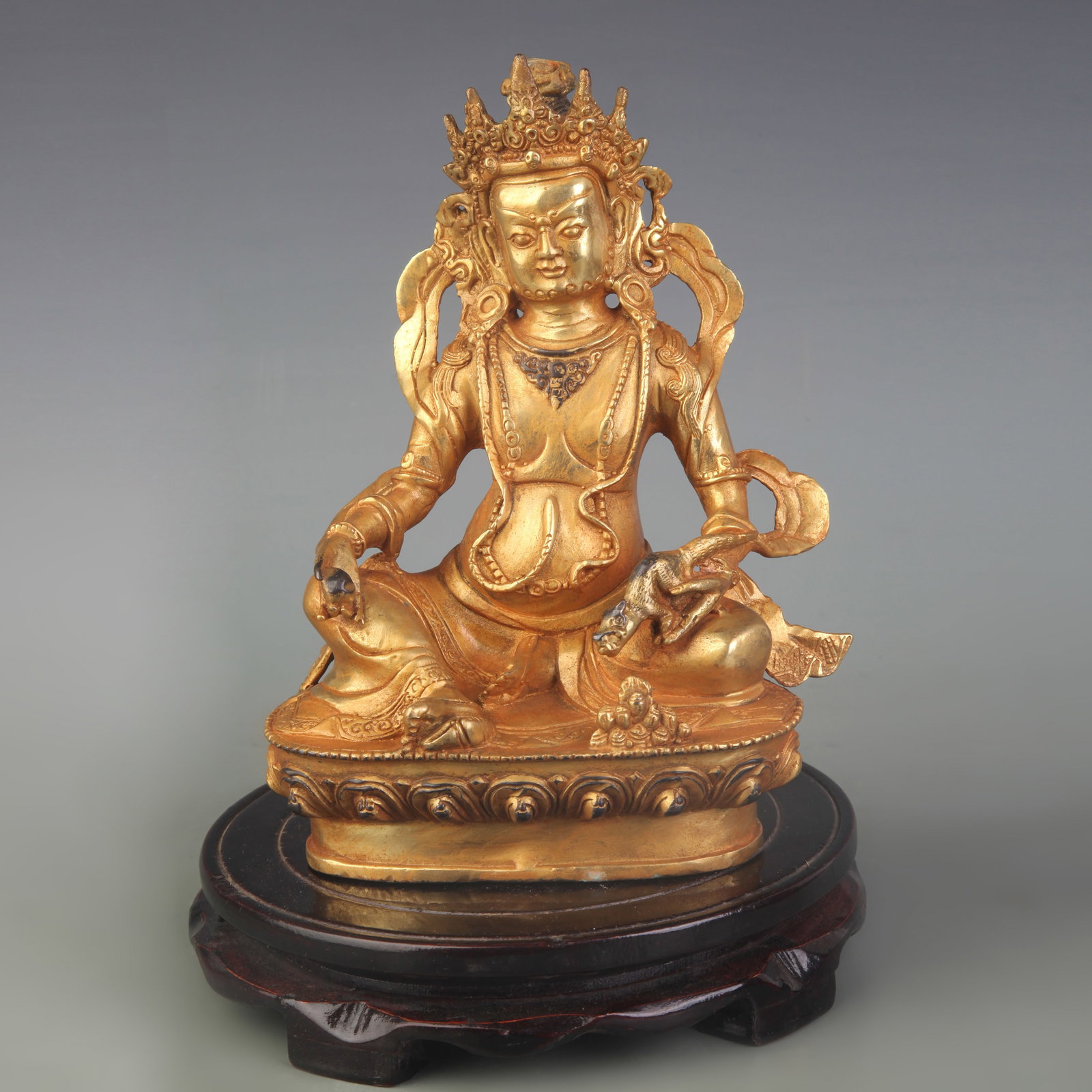 A FINE BRONZE FIGURE OF THE YELLOW JAMBHALA (1 of 5)