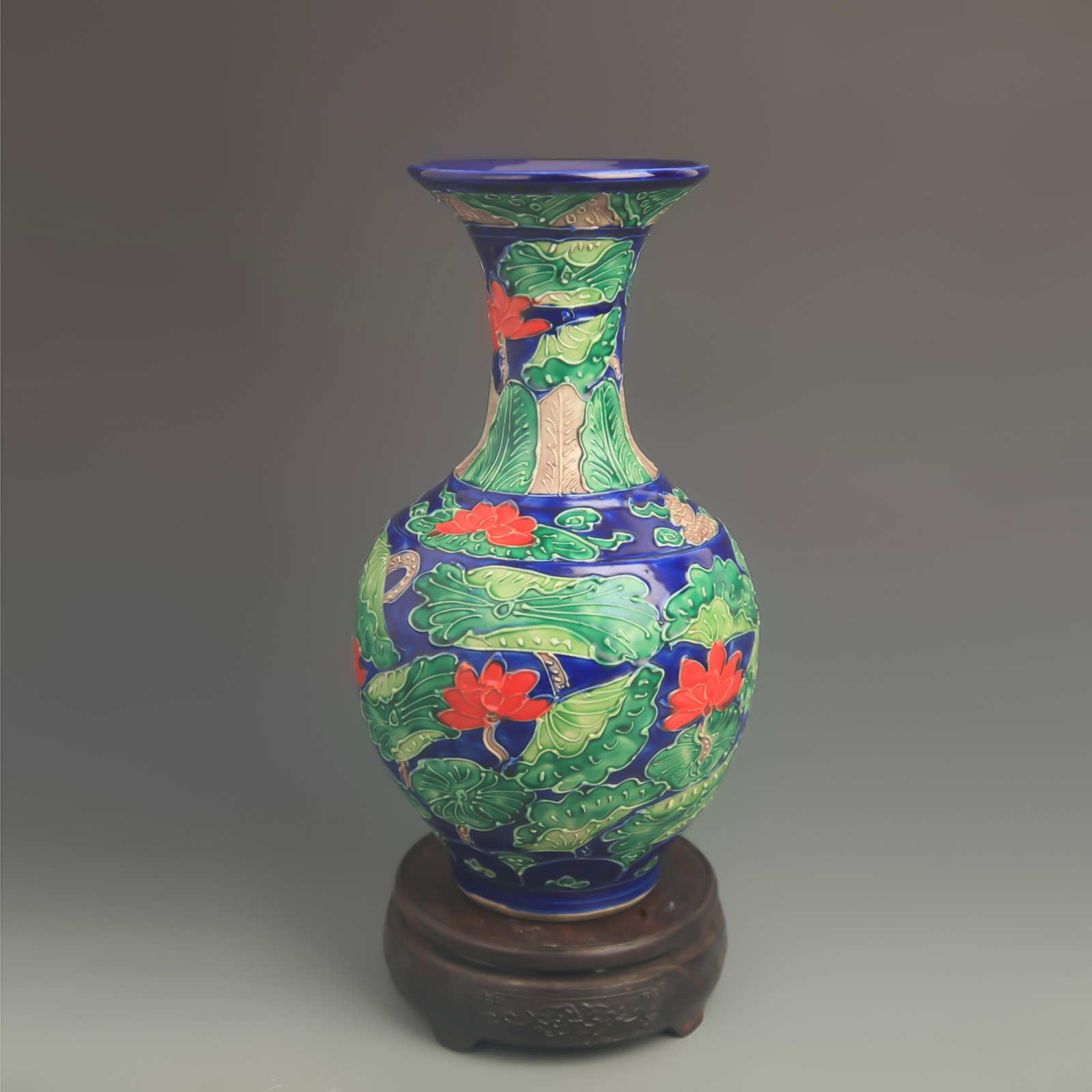 FAHUA-GLAZED BLUE-GROUND FLARED-MOUTH PORCELAIN VASE: Ming Dynasty Hong Zhi Period; High: 11.5 inch; Diameter: 6.00 inch; Woodbase for picture and display only