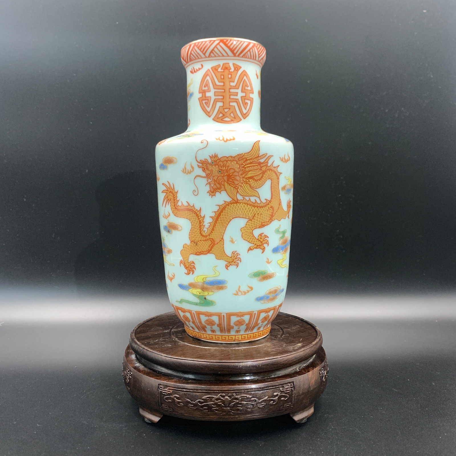 A FINE GREEN UNDERGLAZED "IMPERIAL DRAGON" PATTERN PORCELAIN VASE: Qing Dynasty; High: 8.9 inch; Diameter: 4.3 inch; Woodbase for picture and display only