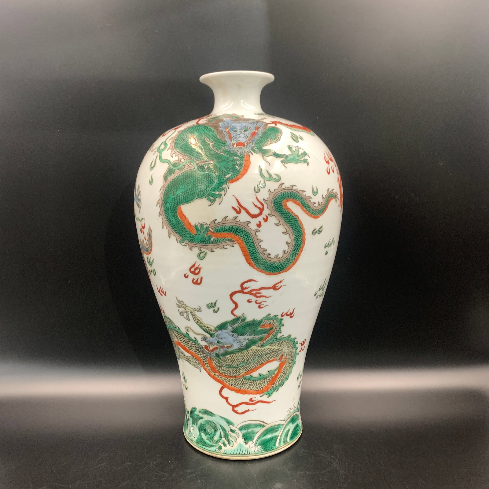 A FINE WUCAI "THREE DRAGONS" PORCELAIN MEIPING VASE: Qing Dynasty; High: 16.4 inch; Diameter: 9 inch; Woodbase for picture and display only