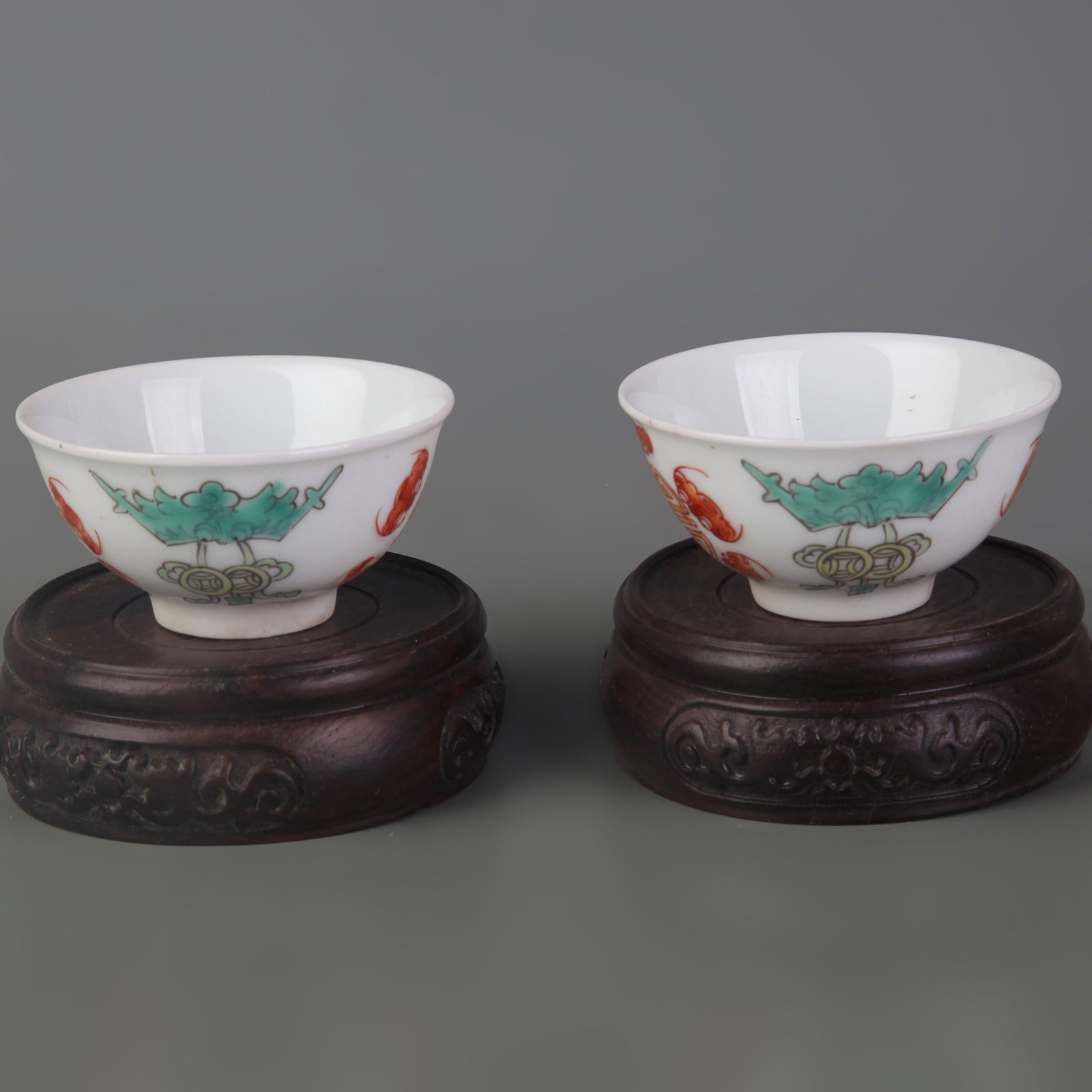 PAIR OF SMALL FAMILLE ROSE LONGEVITY AND FORTUNE PATTERN CUP: Qing Dynasty; Diameter: 2.6 inch; High: 1.2 inch; Woodbase for picture and display only
