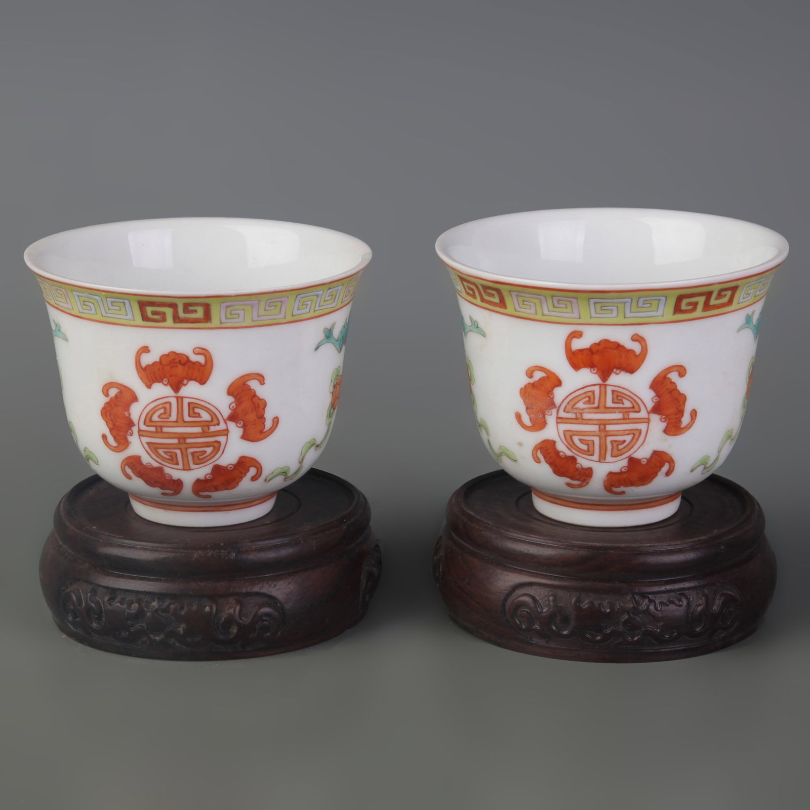 PAIR OF FAMILLE-ROSE ‘FU AND SHOU’ BOWLS: Qing Dynasty Tong Zhi Style; Diameter: 3.1 inch; High: 2.3 inch; Woodbase for picture and display only