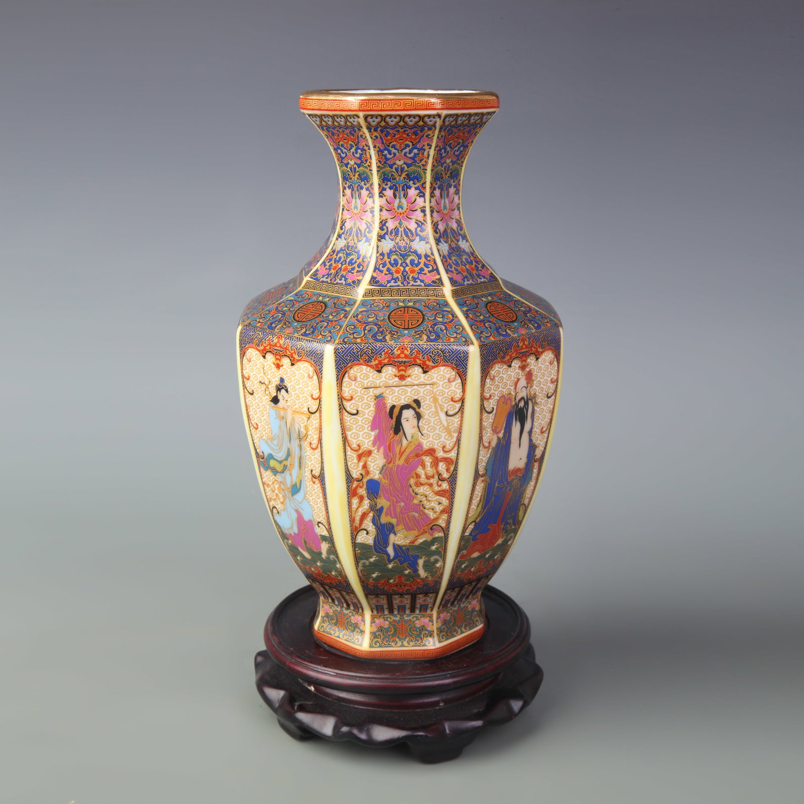 FAMILLE ROSE AND YANGCAI OCTAGONAL VASE: Qing Dynasty Yong Zheng Period; High: 9.1inch; Woodbase for picture and display only