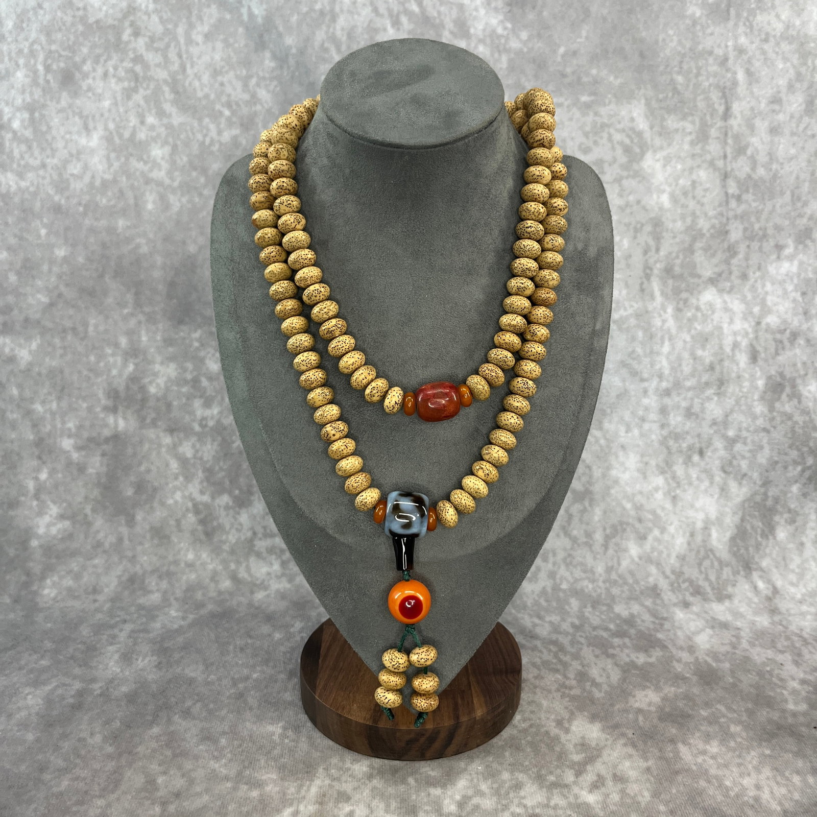 A FINE STAR AND MOON BODHI SEED BEAD MADE NECKLACE: Modern; Long: 19.5 inch; Diameter: 0.4 inch; Woodbase for picture and display only