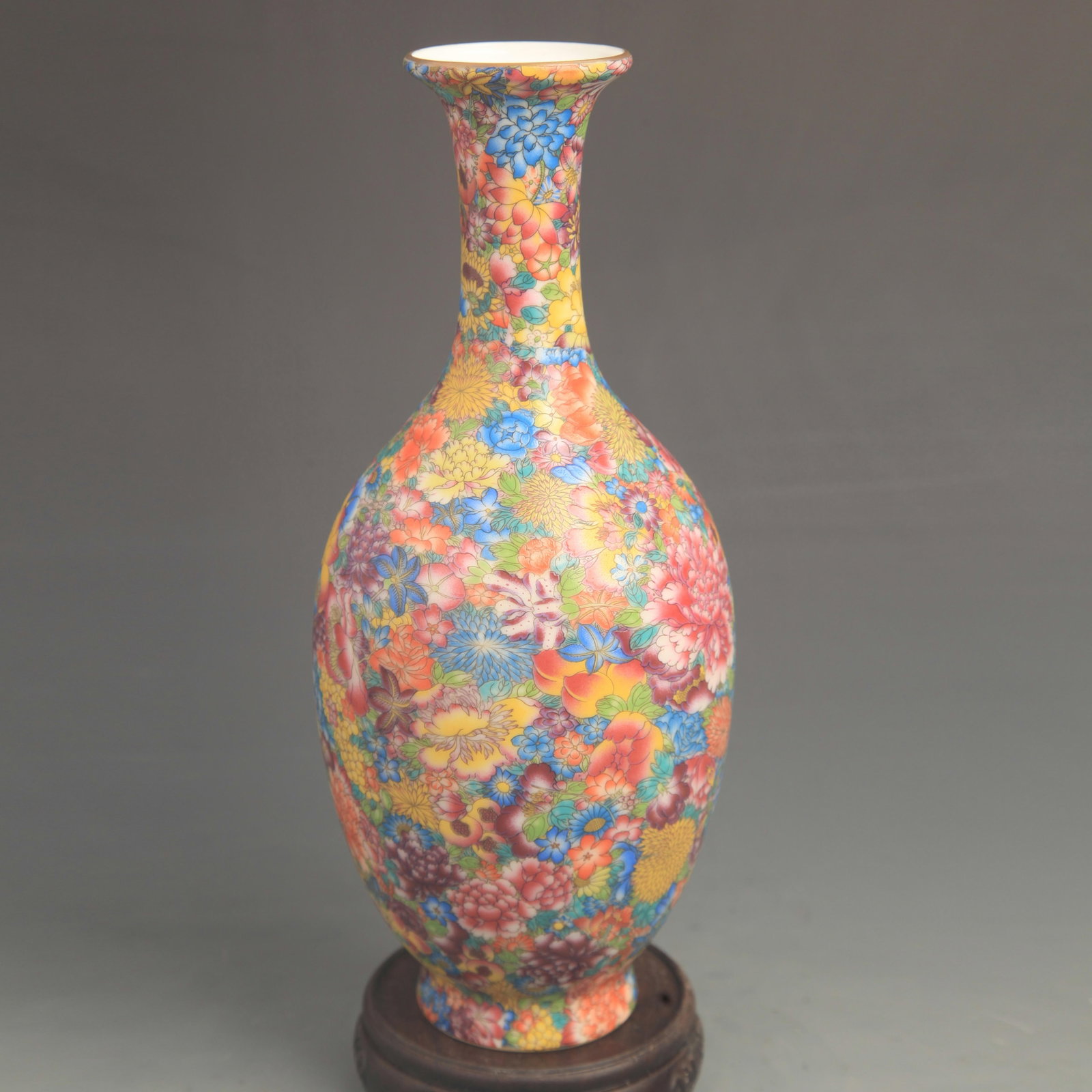 CLOISONNE COLOR GLAZED FLOWER PATTERN OLIVE-SHAPED PORCELAIN VASE: Qing Dynasty Qian Long Period; Diameter: High: 10.0 inch; Diameter:4.50 inch; Woodbase for picture and display only