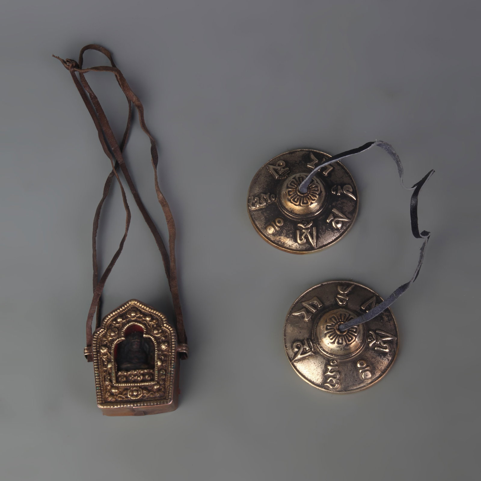GROUP OF TIBETAN BUDDHIST RITUAL IMPLEMENTS: Qing Dynasty; Long: 2.5 inch; Woodbase for picture and display only