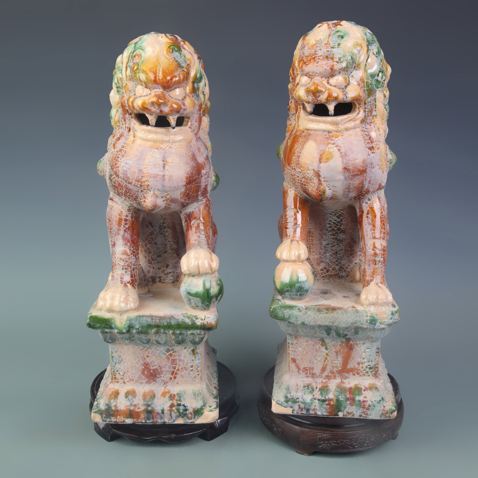 PAIR OF SANCAI POTTERY LION FIGURES: Liao Dynasty Style; Long:15.5inch, Width: 6.2inch; Woodbase for picture and display only