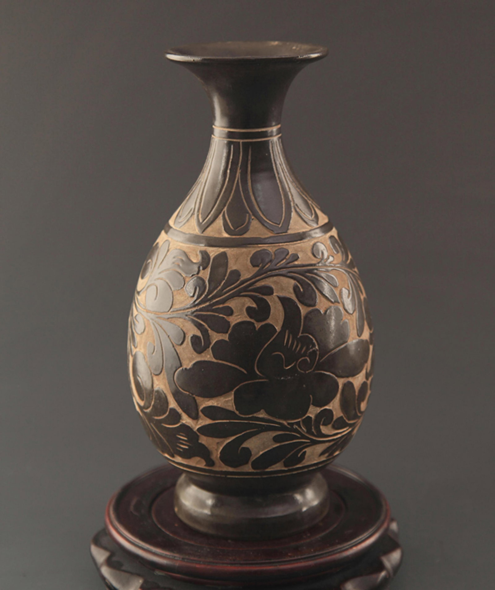 CIZHOU KILN YU HU CHUN PORCELAIN VASE WITH CARVED FLORAL SCROLL: Song Dynasty Style; High: 10.25inch; Diameter: 3.5inch; Woodbase for picture and display only