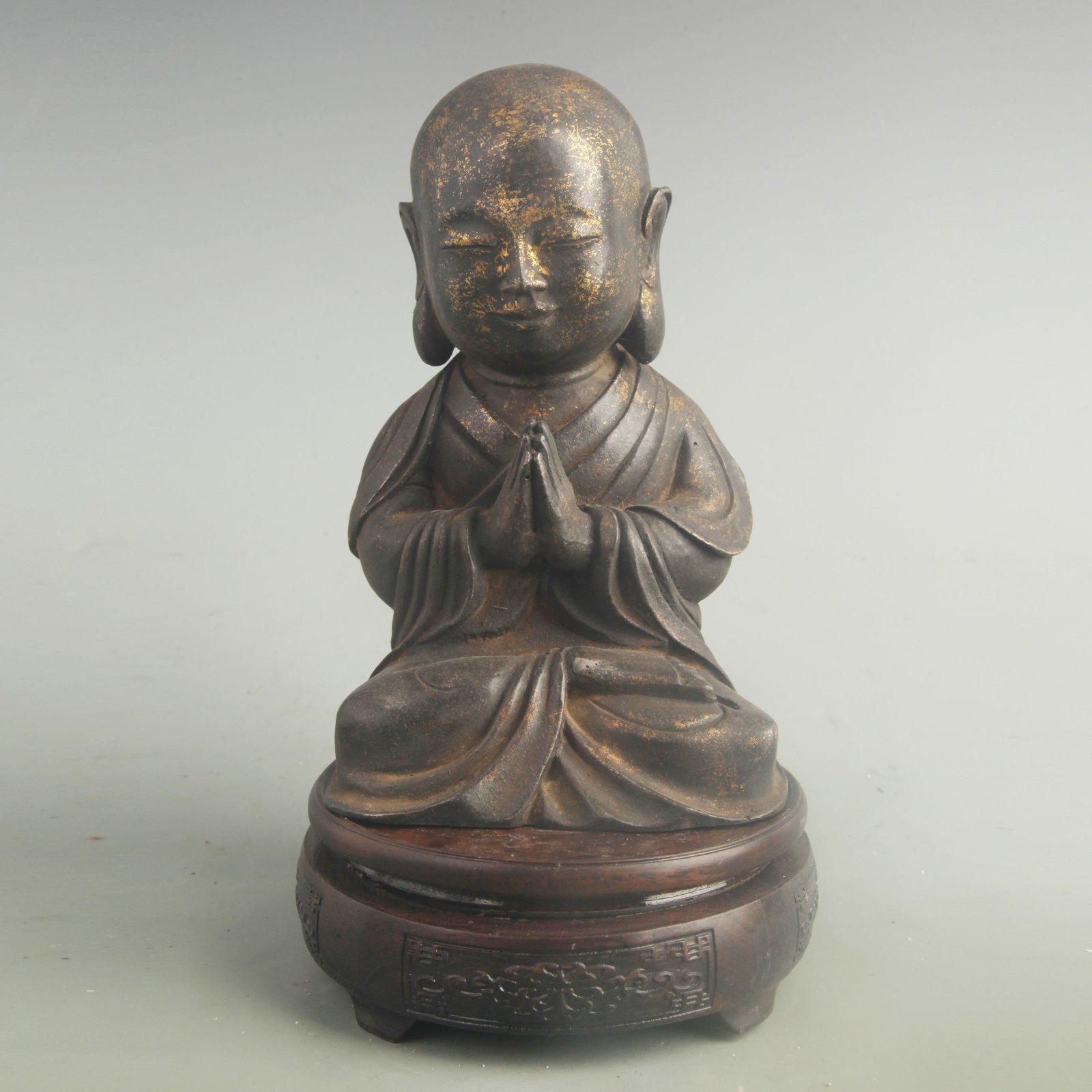 A FINE BRONZE GILT SMALL BUDDHA STATUE: 19th Century; High: 7.20 inch; Width: 4.50 inch; Woodbase for picture and display only