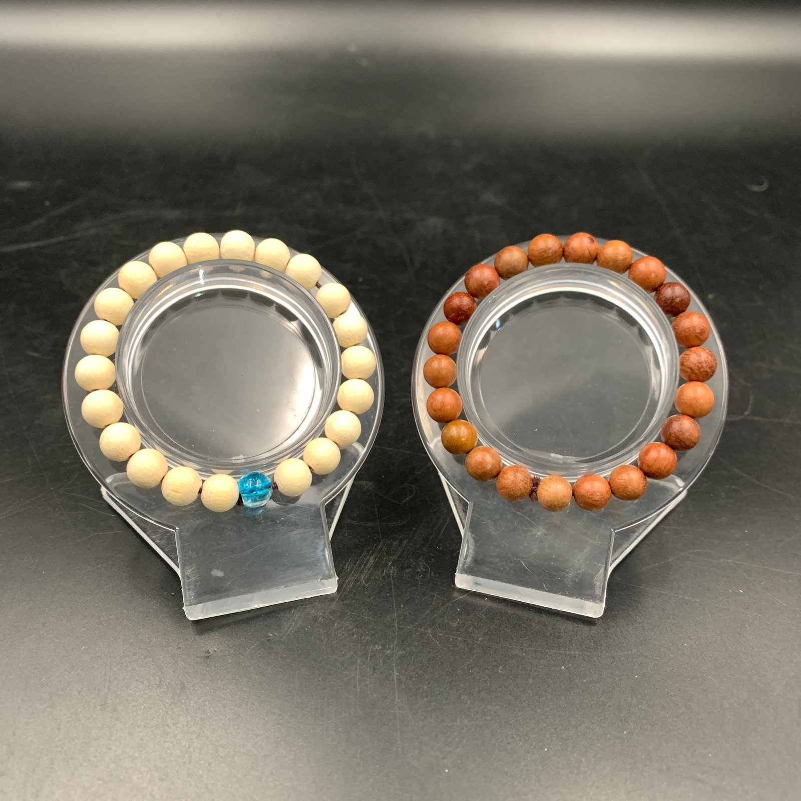 PAIR OF LIGHT-TONED WOODEN BUDDHIST PRAYER BEAD BRACELETS: Modern; Long: 3.2 inch; Diameter: 0.3 inch; Long: 3.6 inch; Diameter: 0.3 inch; Woodbase for picture and display only