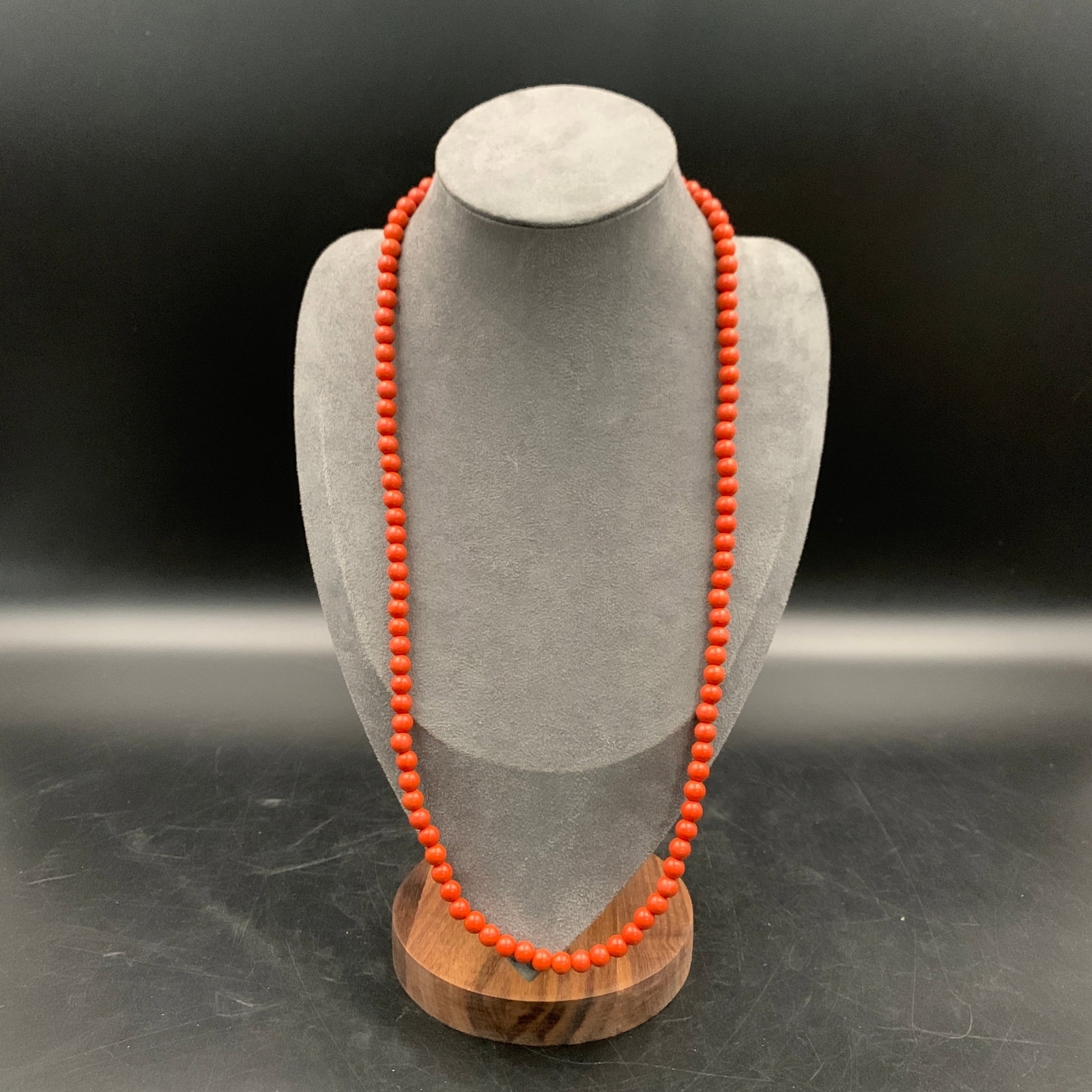 SOUTH RED AGATE ROUND BEAD NECKLACE: Modern; Long: 13 inch; Diameter: 0.2 inch; Woodbase for picture and display only