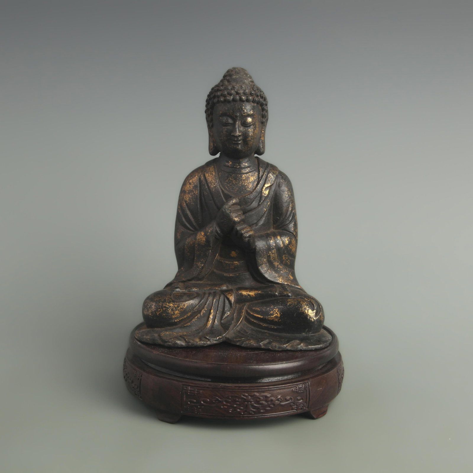 A FINE BRONZE GILT SEATED STATUE OF SAKYAMUNI: 19th Century; High: 8.00 inch; Width: 4.00 inch;Long: 5.80 inch; Woodbase for picture and display only