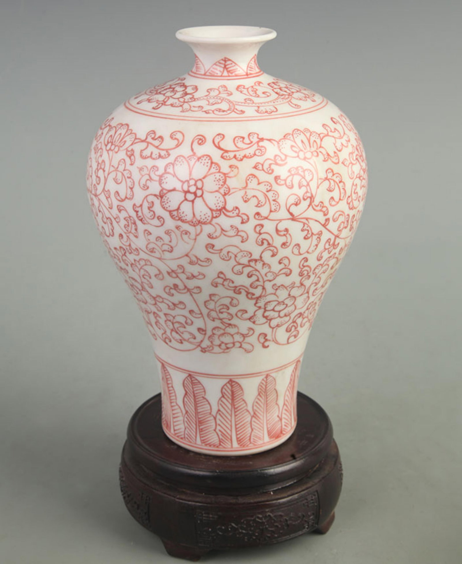 A FINE UNDERGLAZE RED MEIPING (PLUM) PORCELAIN VASE: Qing Dynasty Qian Long Period; High: 8.00 inch; Width: 5.00 inch; Woodbase for picture and display only