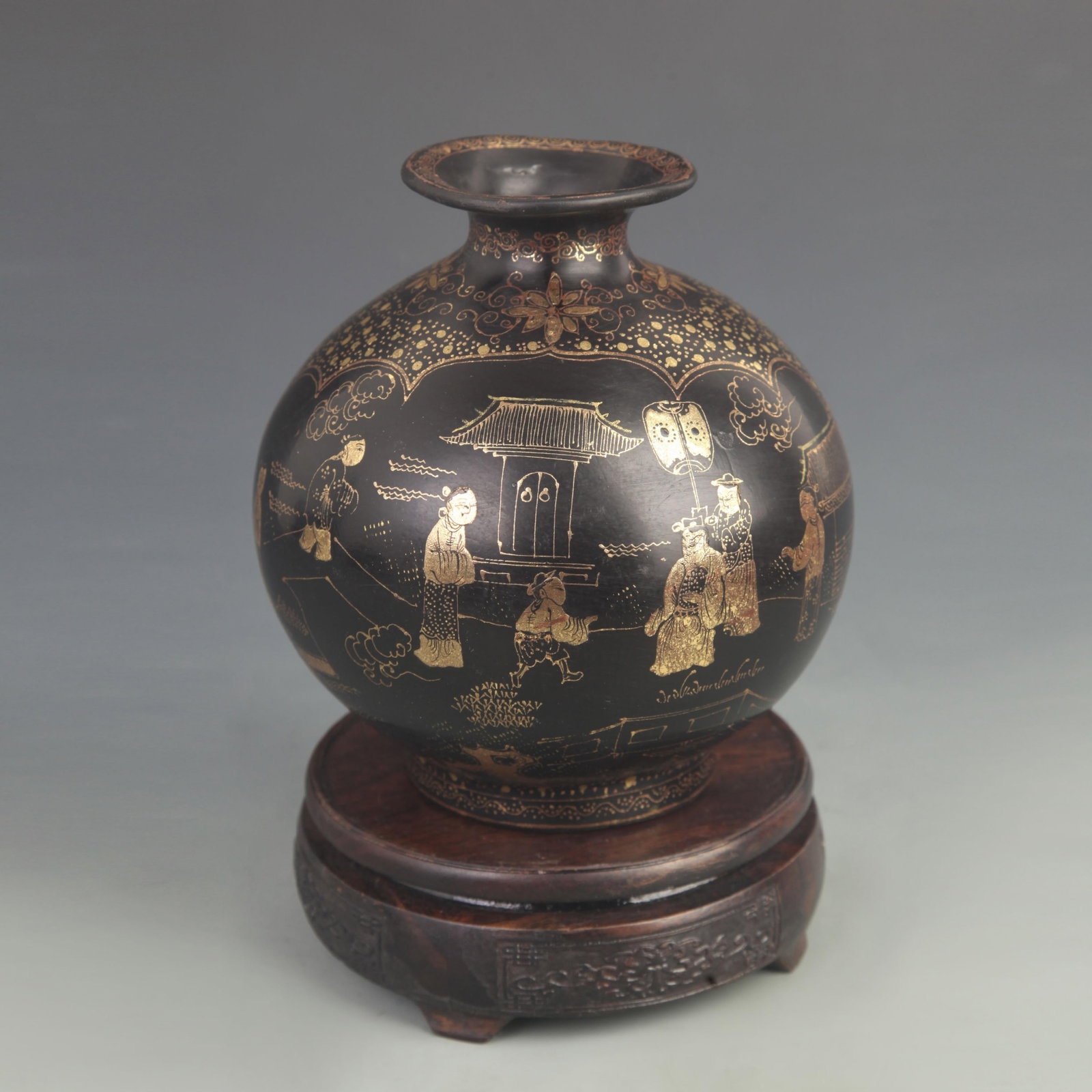 A FINE LACQUER PAINTED VASE WITH GILT DECORATION AND FIGURE SCENES: Qing Dynasty Kang Xi Period; High: 6.50 inch; Diameter: 2.75 inch; Woodbase for picture and display only