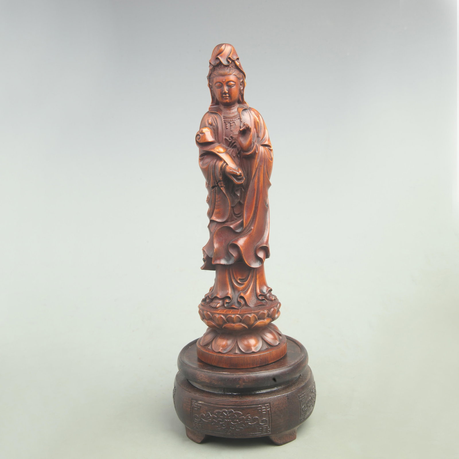 A FINE BOXWOOD CARVED GUANYIN ORNAMENT: Qing Dynasty, High: 8.1 inch; Width: 2.4 inch; Woodbase for picture and display only