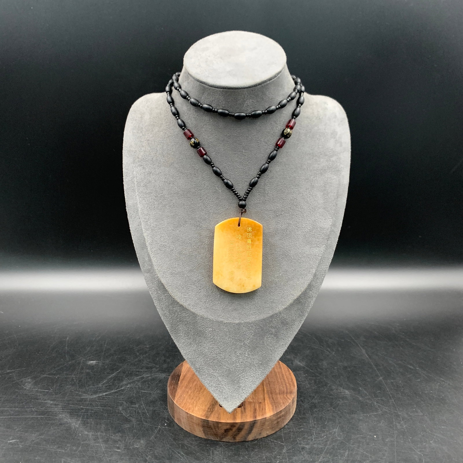 JADE MADE CALCITE INCISED BUDDHIST SUTRA PLAQUE NECKLACE: Modern; Long: 12.8 inch; Long: 2.2 inch; Width: 1.4 inch; High: 0.3 inch; Woodbase for picture and display only