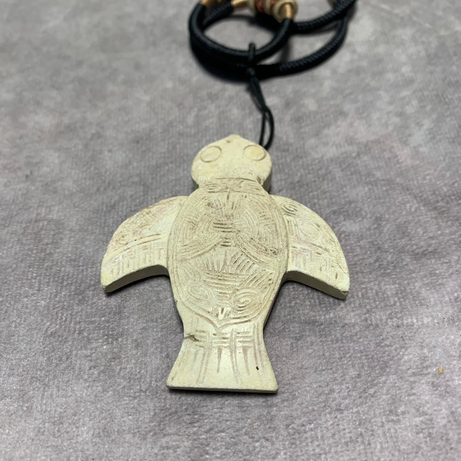 SHANG DYNASTY STYLE EAGLE SHAPED JADE PENDANT: Shang Dynasty Style; Long: 2.6 inch; Width: 2.2 inch; Height; 0.3 inch; Woodbase for picture and display only