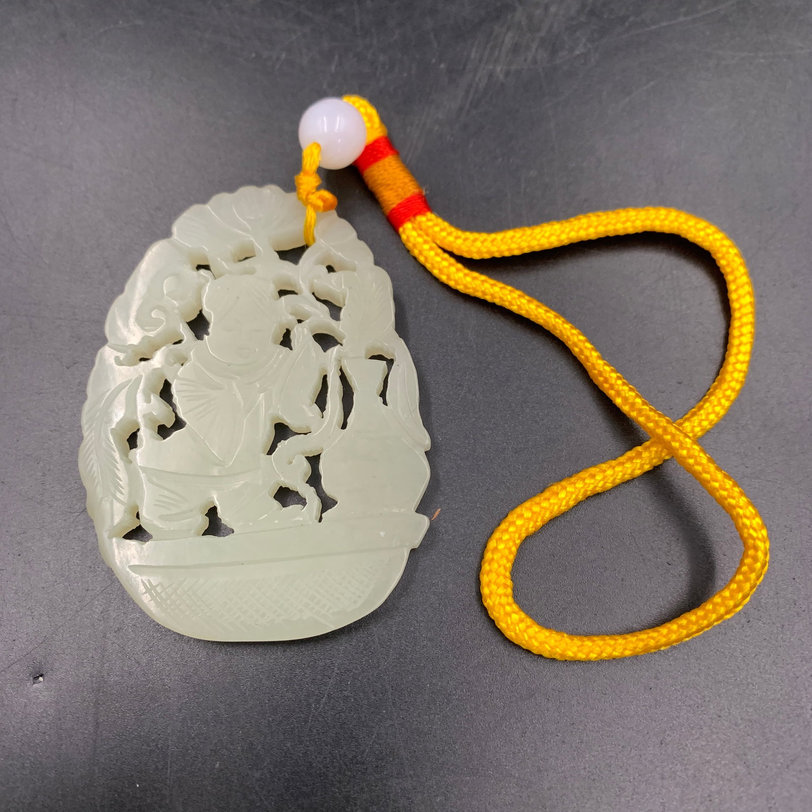OPENWORK CARVED WHITE JADEITE "BOY ON A DRAGON BOAT" PENDANT (1 of 3)