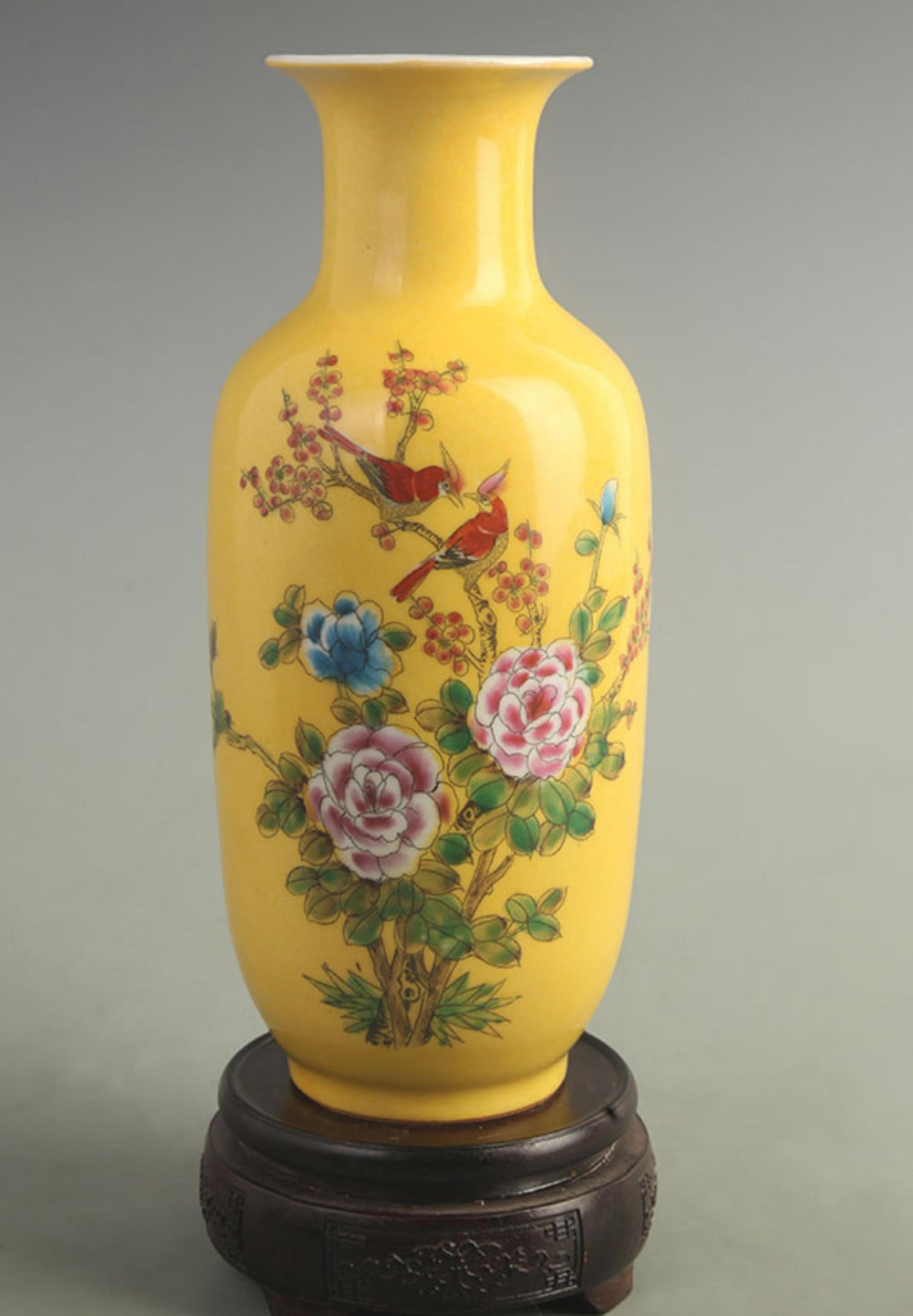 FAMILLE ROSE YELLOW GROUND MAGPIE ON PLUM PATTERN PORCELAIN VASE: Qing Dynasty Qian Long Period; High: 10.5 inch; Width: 4.50 inch; Woodbase for picture and display only