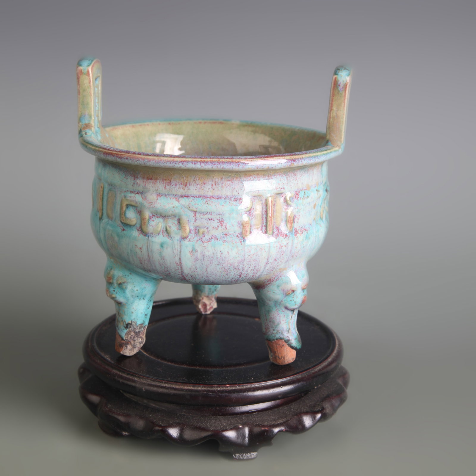 JUN KILN THREE-LEGGED INCENSE BURNER WITH RAISED EARS: Qing Dynasty, Diameter: 4.6 inch; High: 5.2 inch; Woodbase for picture and display only
