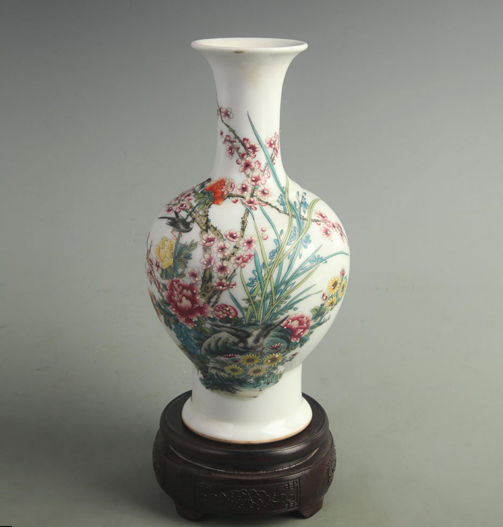 FAMILLE CLOISONNE ENAMEL MAGPIES PERCHING ON PLUM BLOSSOM VASE: Qing Dynasty Qian Long Period; High: 9.50 inch; Width: 5.00 inch; Woodbase for picture and display only