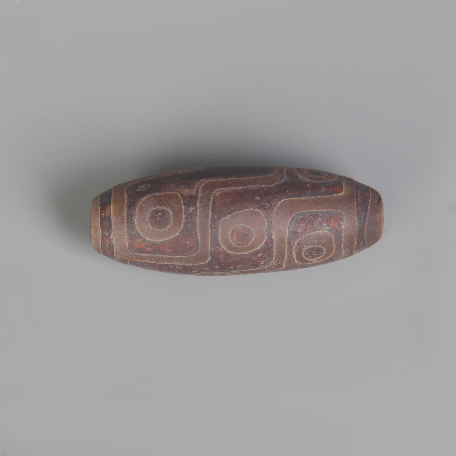A FINE TIBETAN BUDDHIST DI ZI: 20th Century, Long 2.1 inch; Width: 0.8 inch; Woodbase for picture and display only
