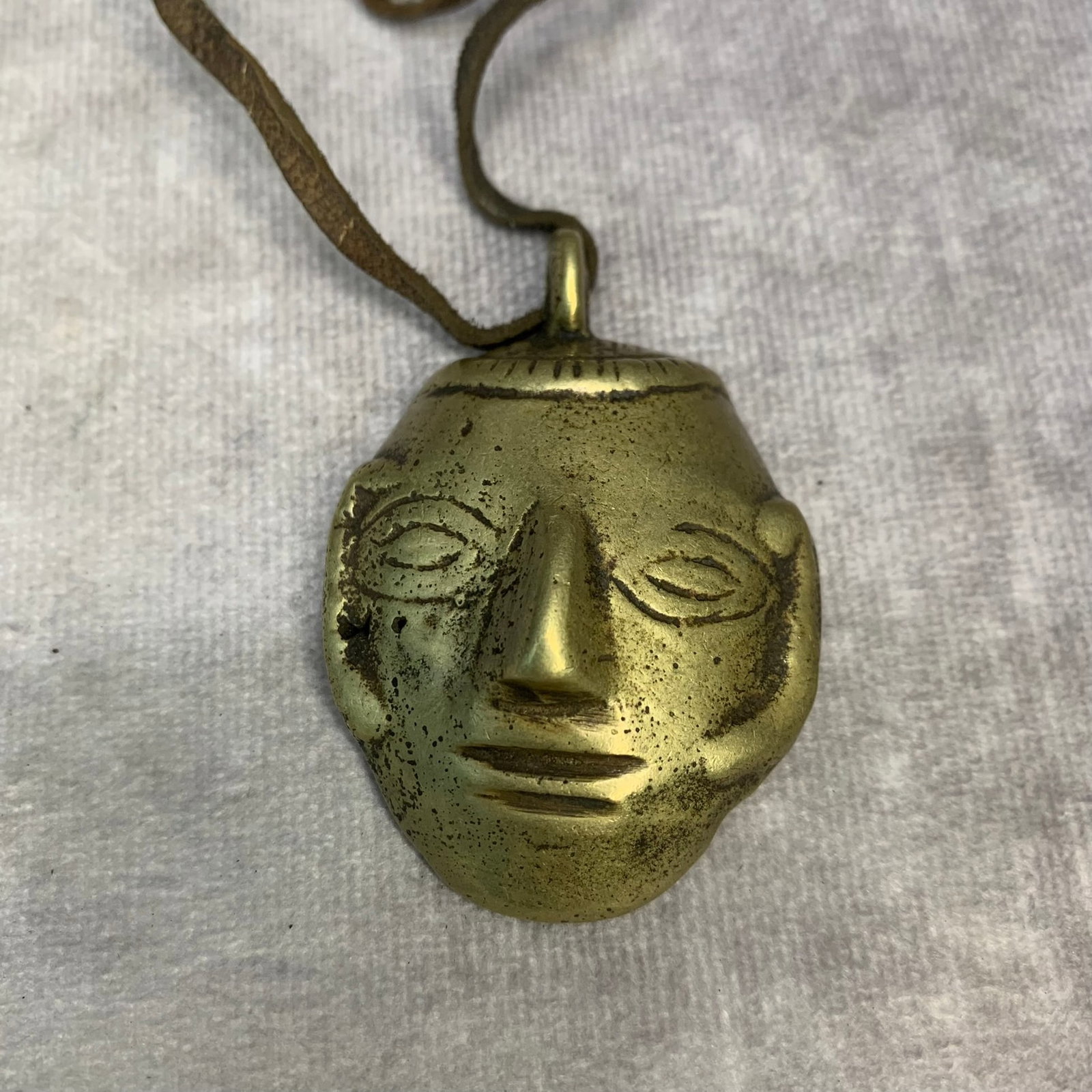 A FINE TIBETAN BUDDHIST INSTRUMENTS PENDANT: Modern; High: 2.3 inch; Width: 1.6 inch; Woodbase for picture and display only