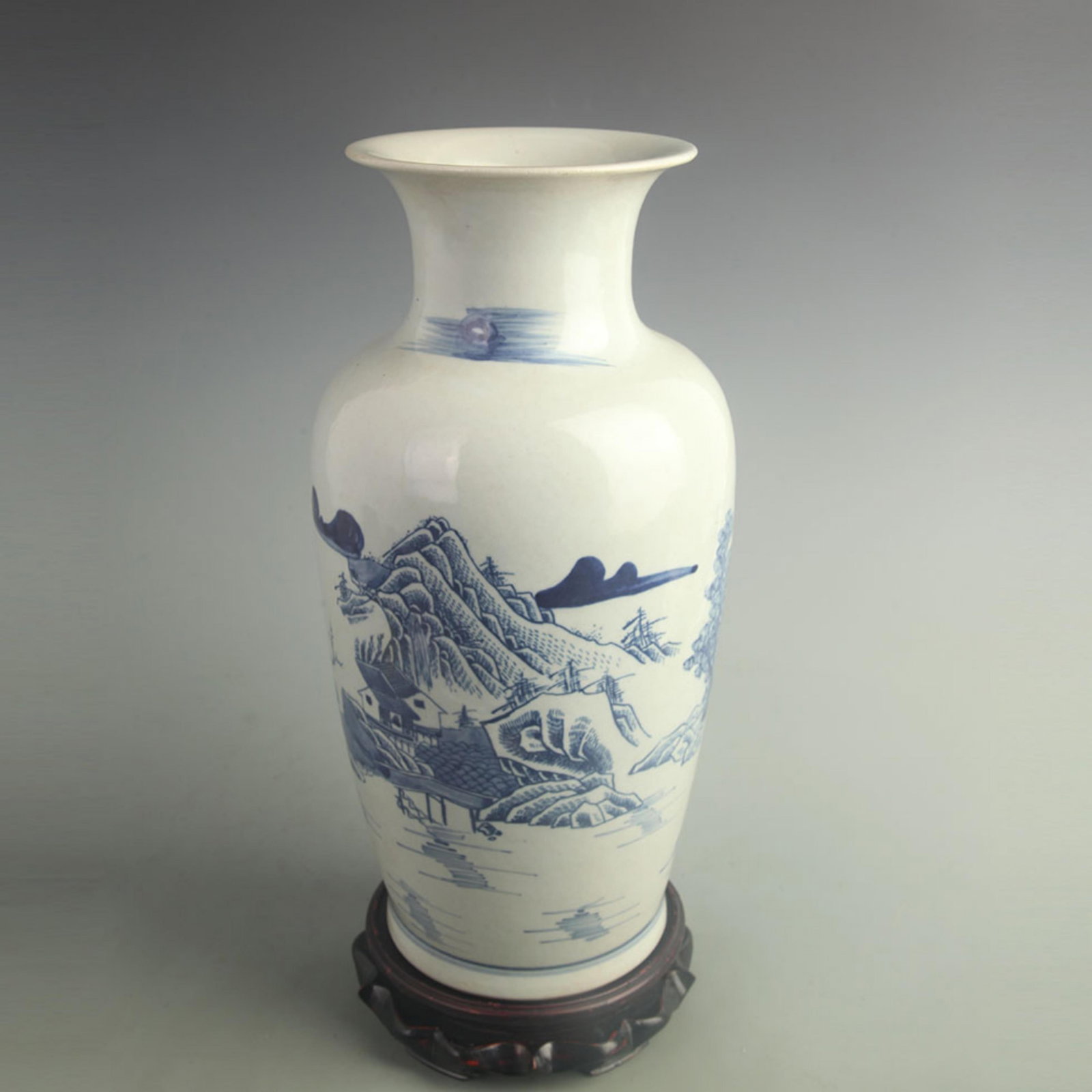 BLUE AND WHITE PORCELAIN VASE WITH LANDSCAPE DECORATION: Qing Dynasty; High: 15.2 inch;Width: 7.50 inch; Woodbase for picture and display only