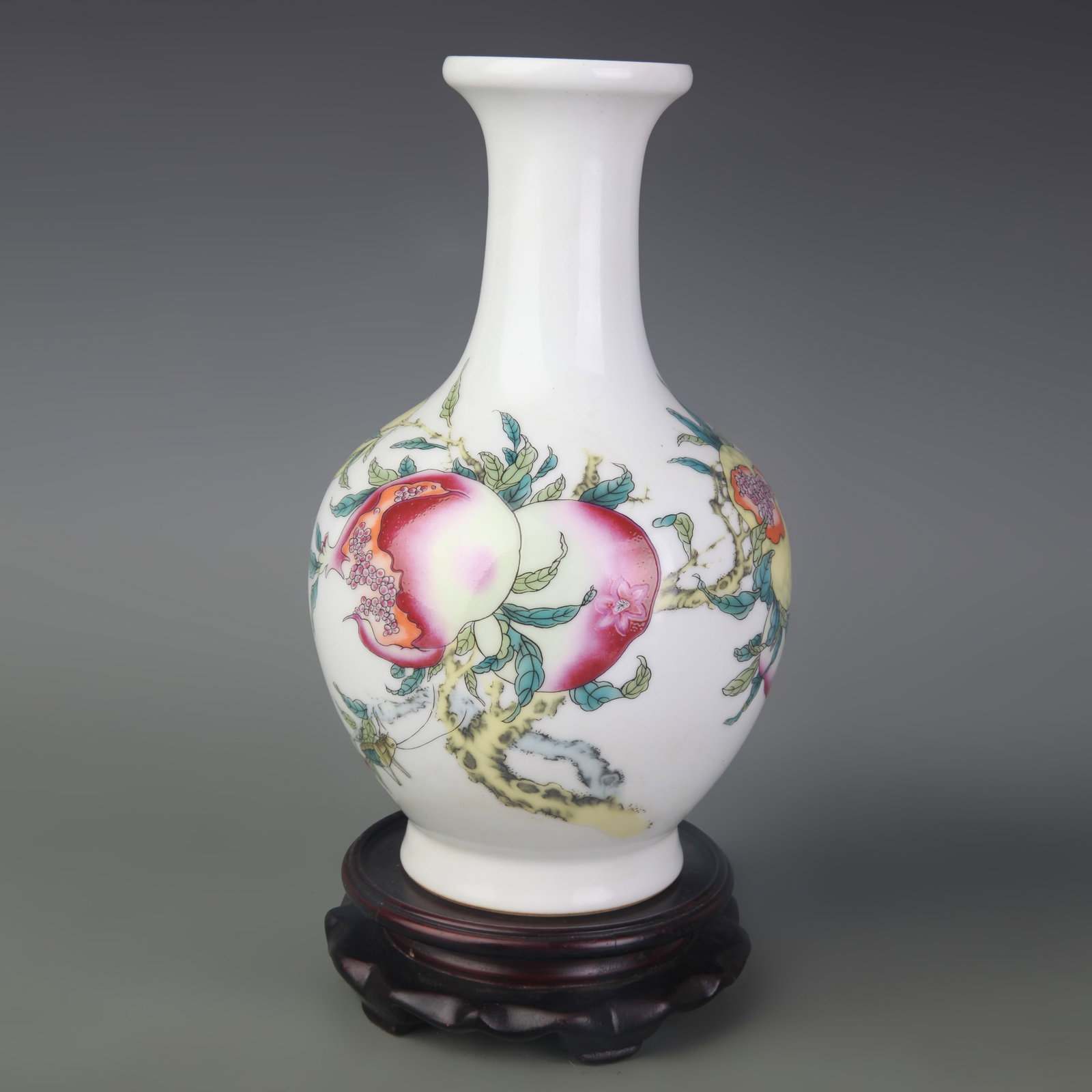 FAMILLE ROSE FLOWER AND BIRD PATTERN APPRECIATION VASE: Qing Dynasty Qian Long Period; Diameter: 2.7 inch; High: 9.5 inch; Woodbase for picture and display only