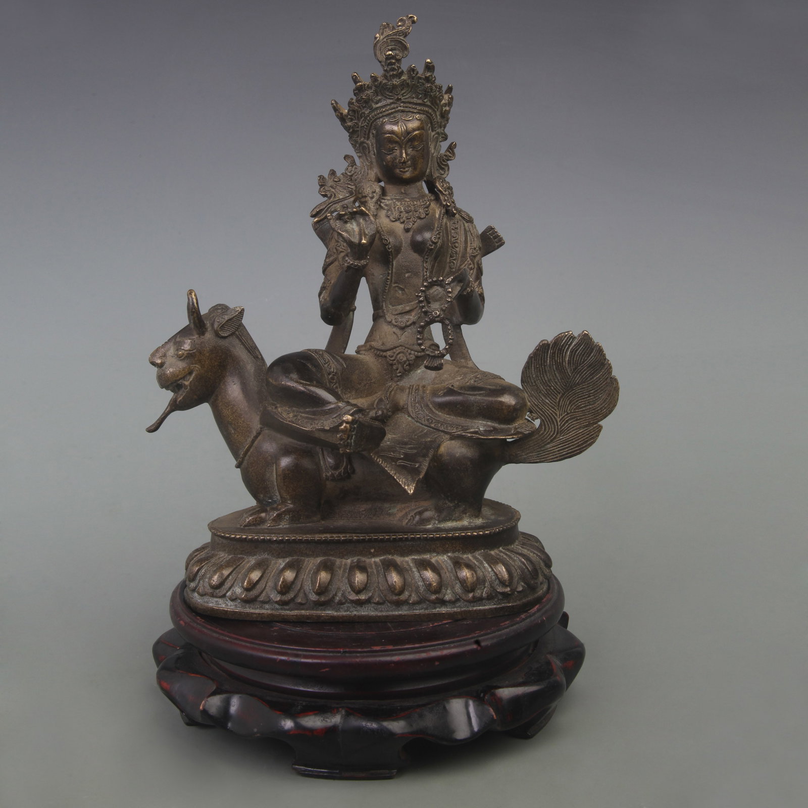 BRONZE STATUE OF THE GODDESS SHRI DEVI: Ming Dynasty; High: 9.5 inch; Width: 5.7 inch; Woodbase for picture and display only